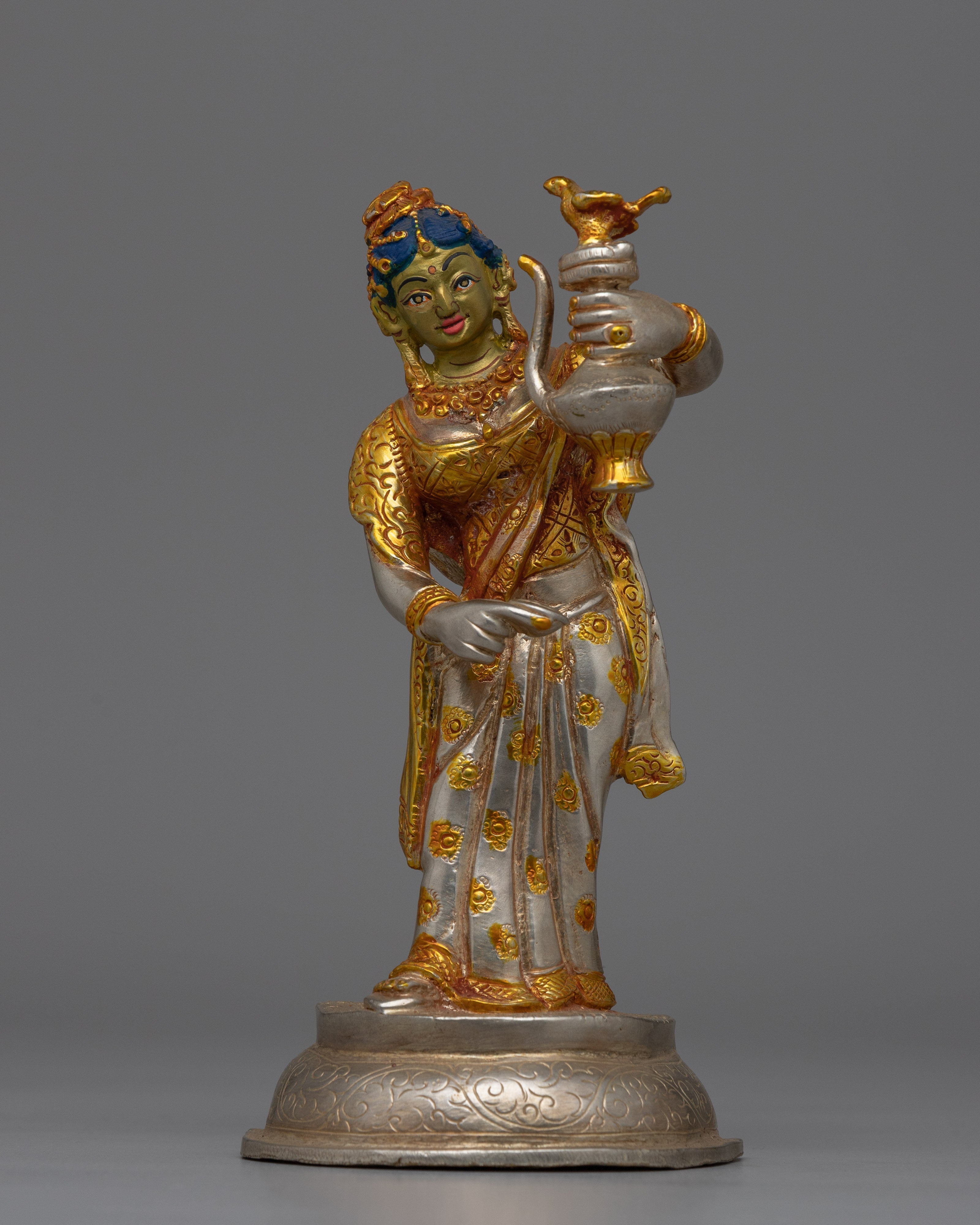 Newari Traditional Clad Silver & Gold-Plated Statue