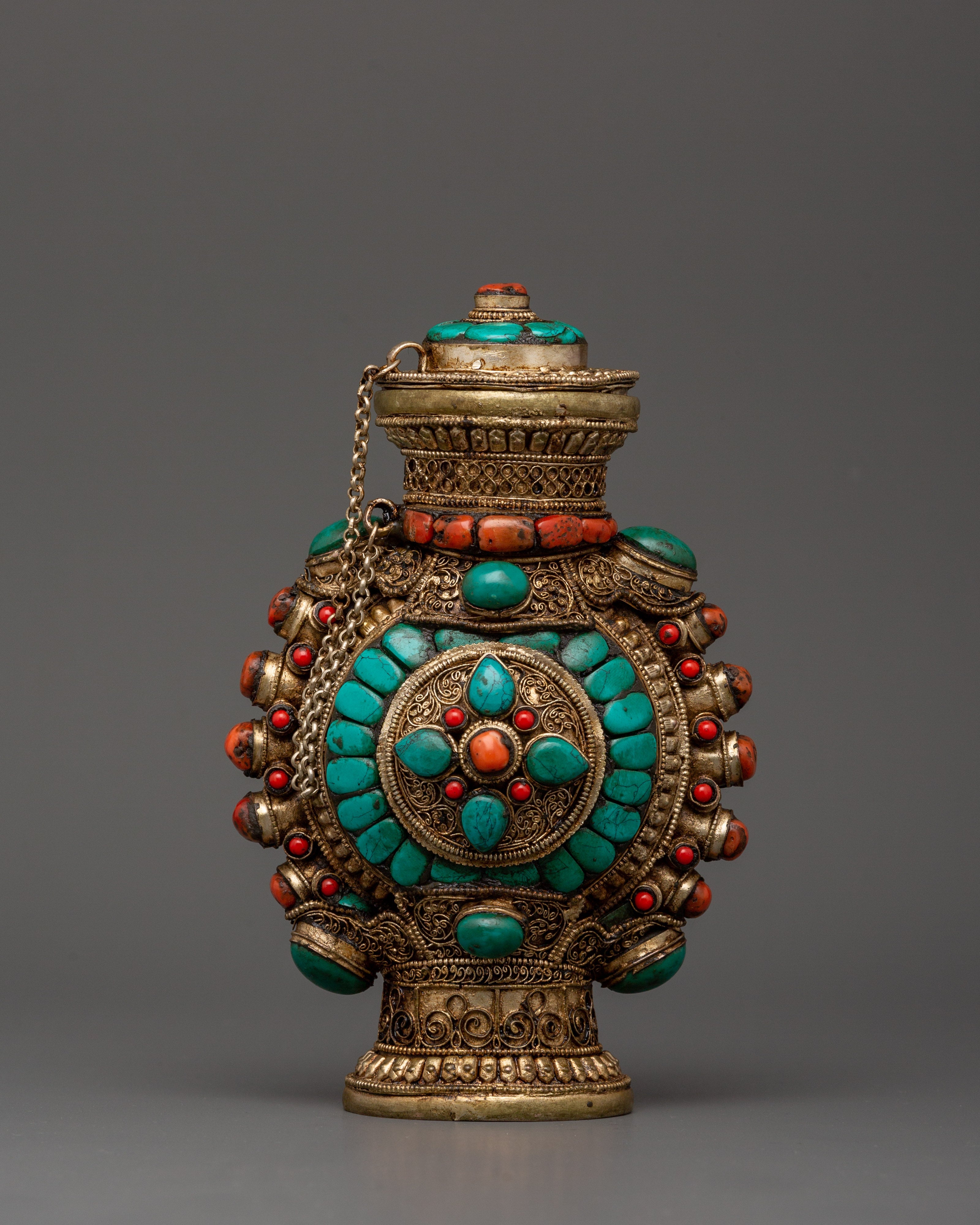 Coral inlaid snuff bottle