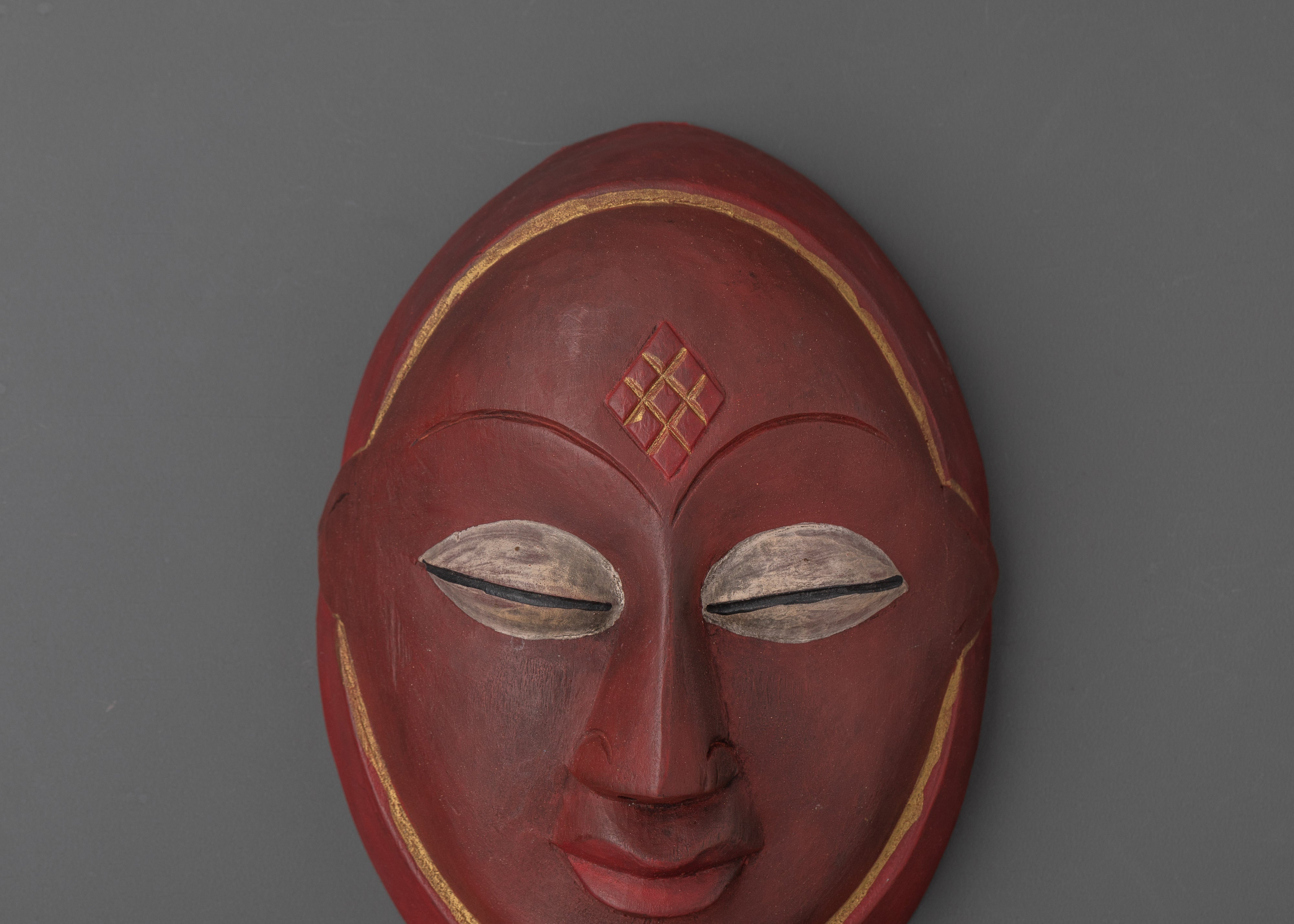 Handcrafted Red Face Mask Decor for Tribal and Ethnic Wall Art