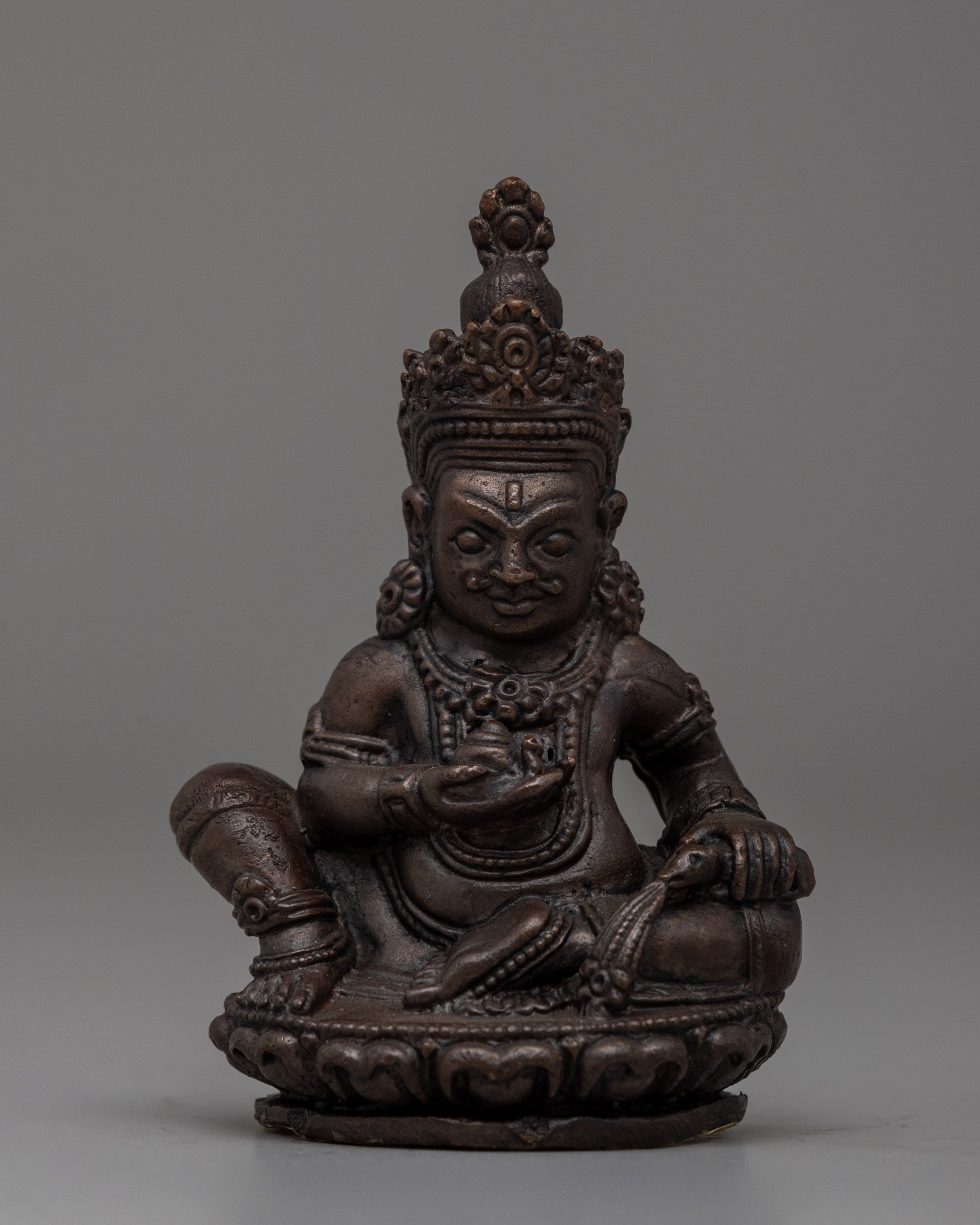 Handcrafted Oxidized Copper Seated Dzambhala Statue