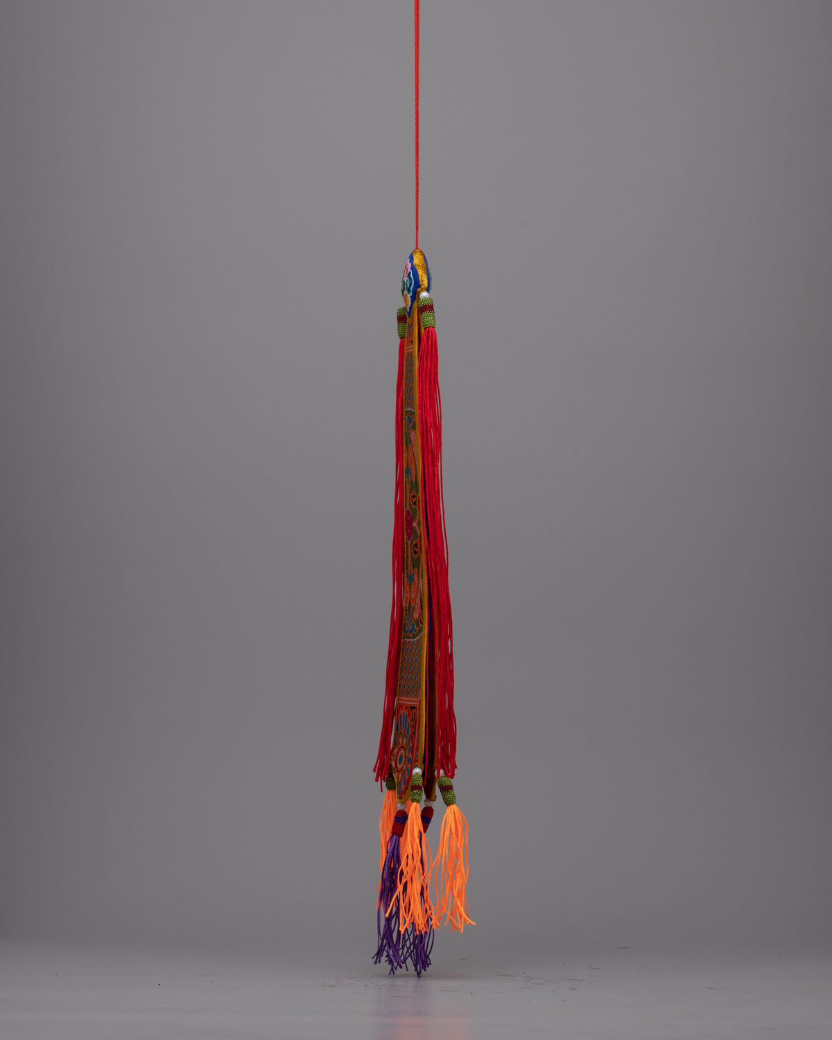 Dharma Damaru Tail | Detailed Elegance Reflecting Spiritual Resonance