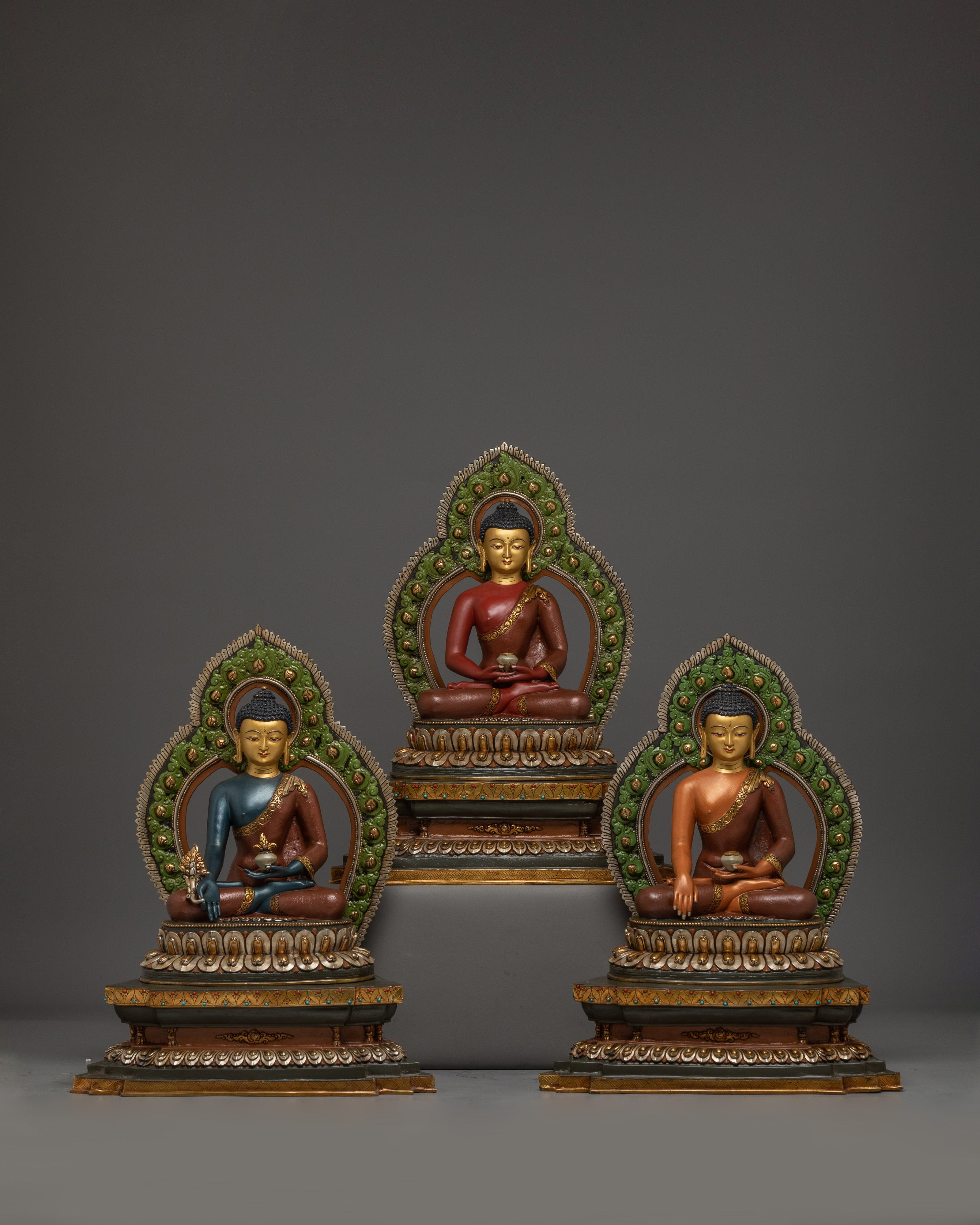 triple-buddha-sculpture