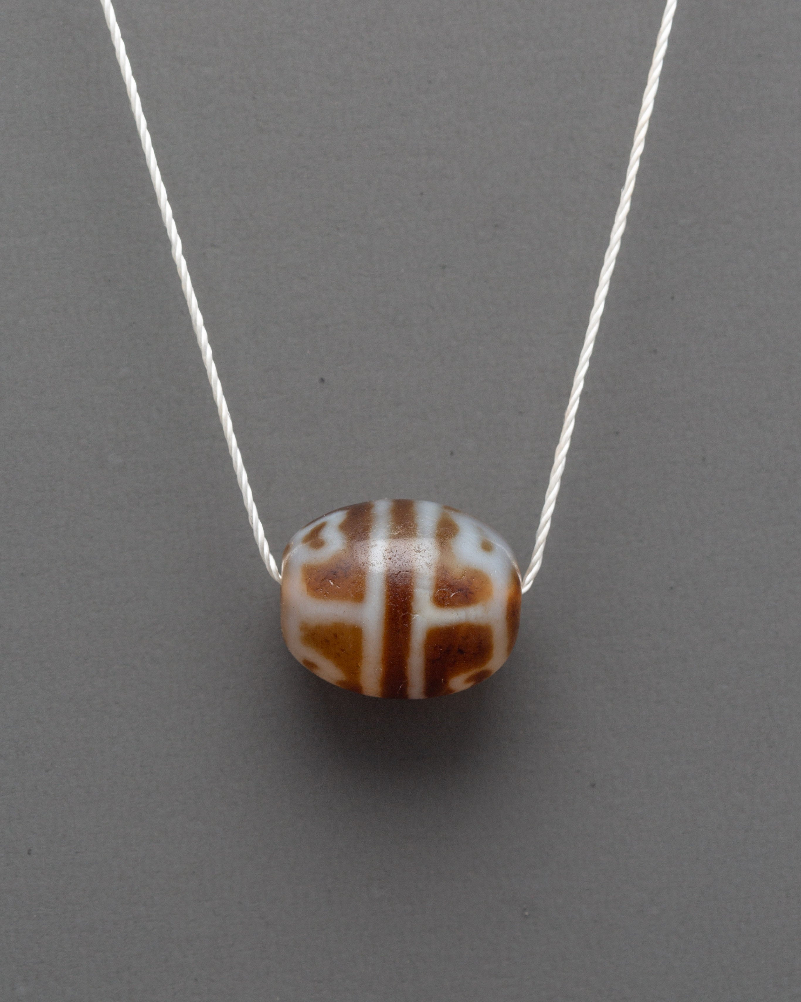 Tibetan Dzi Bead Locket | Handcrafted Spiritual Pendant for Protection