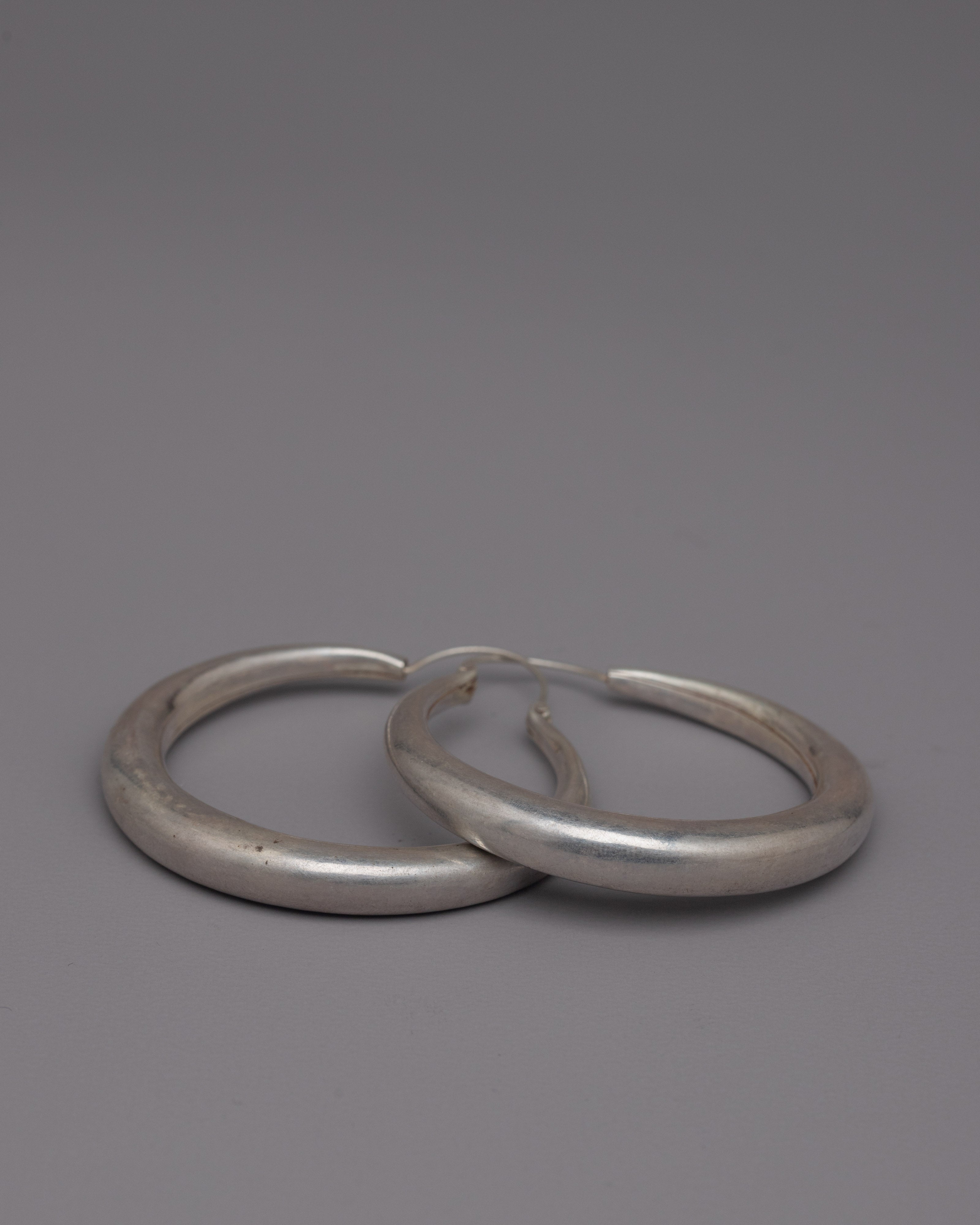 Silver Hoop Earrings | Handcrafted Earrings Enhancing Any Outfit with Elegant Silver Hoops