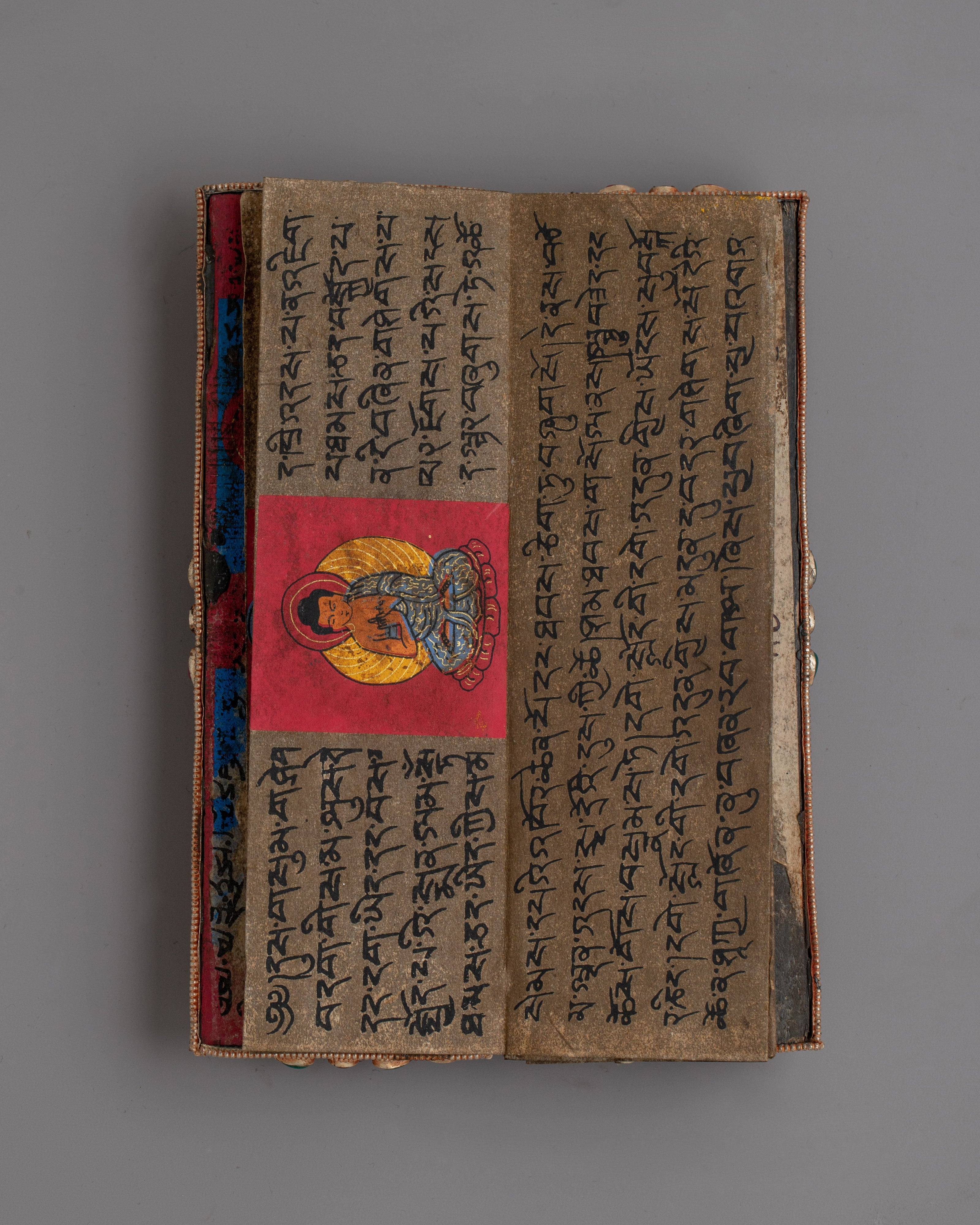 Decorative Tibetan Prayer Book | Elegant Spiritual Text with Copper and Gem Inlays