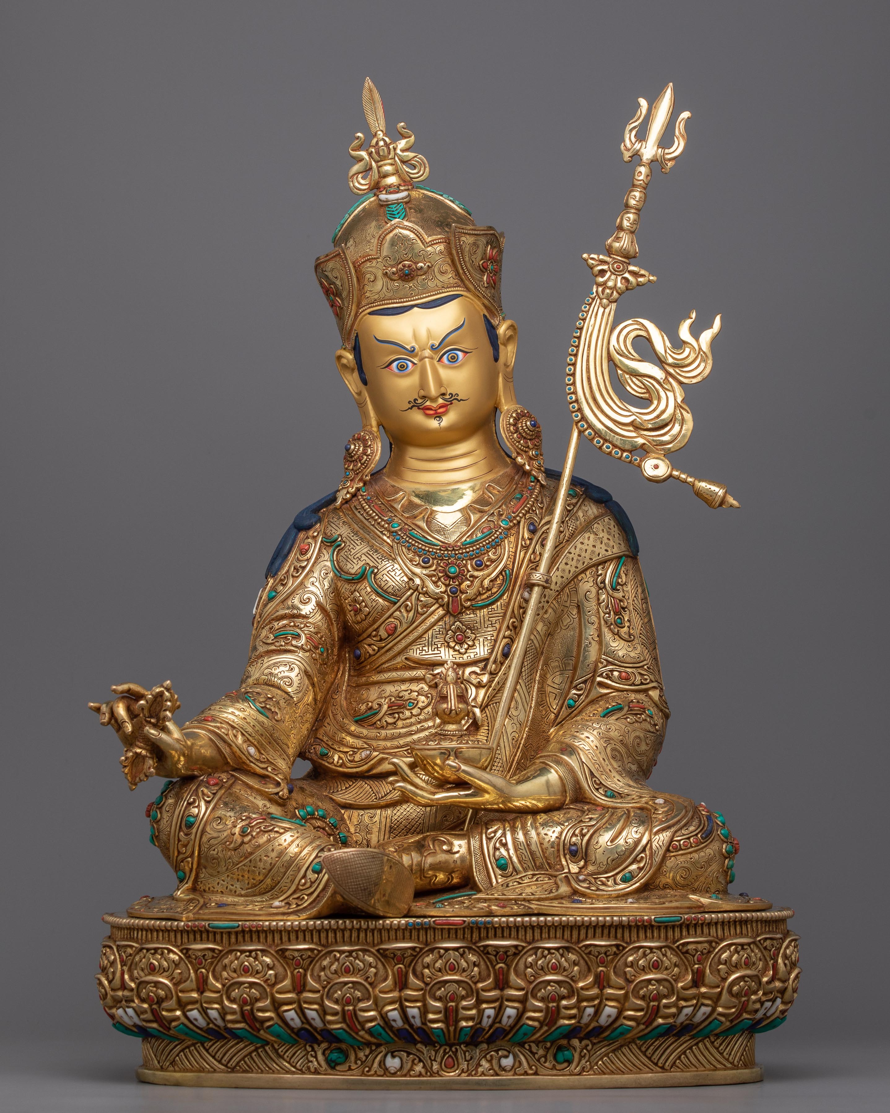 statue of guru rinpoche mantra to remove obstacles