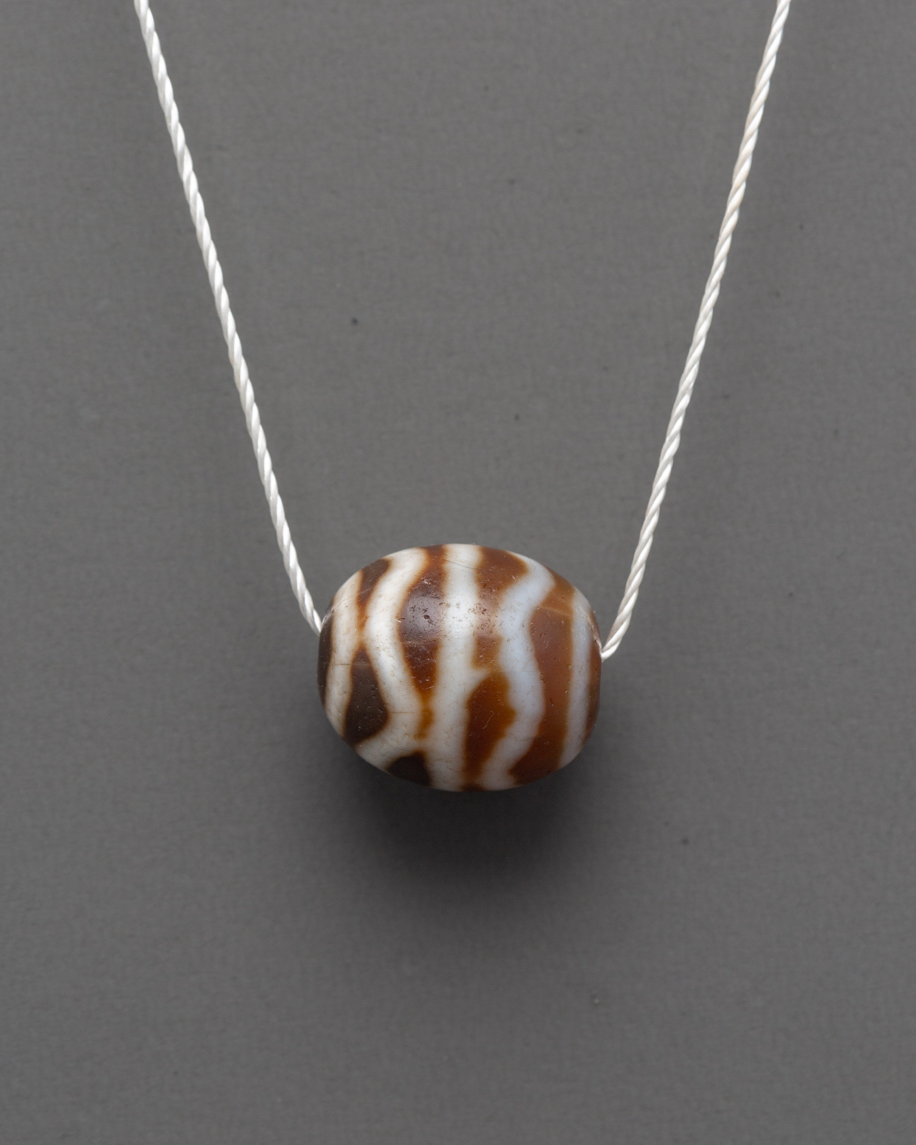 Sacred Tibetan Dzi Bead Locket | Spiritual Pendant for Protection and Blessings