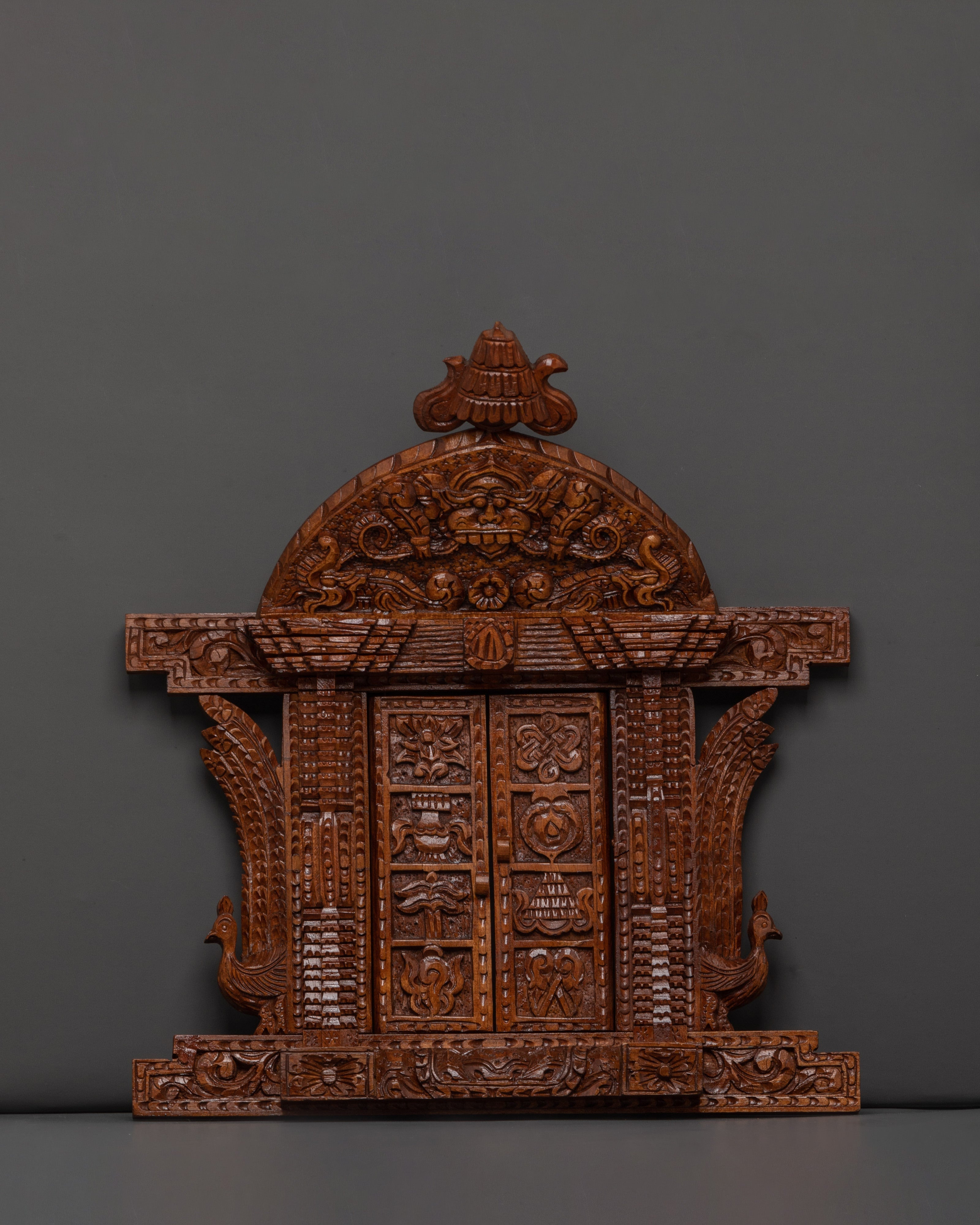 auspicious symbols engraved wall hanging