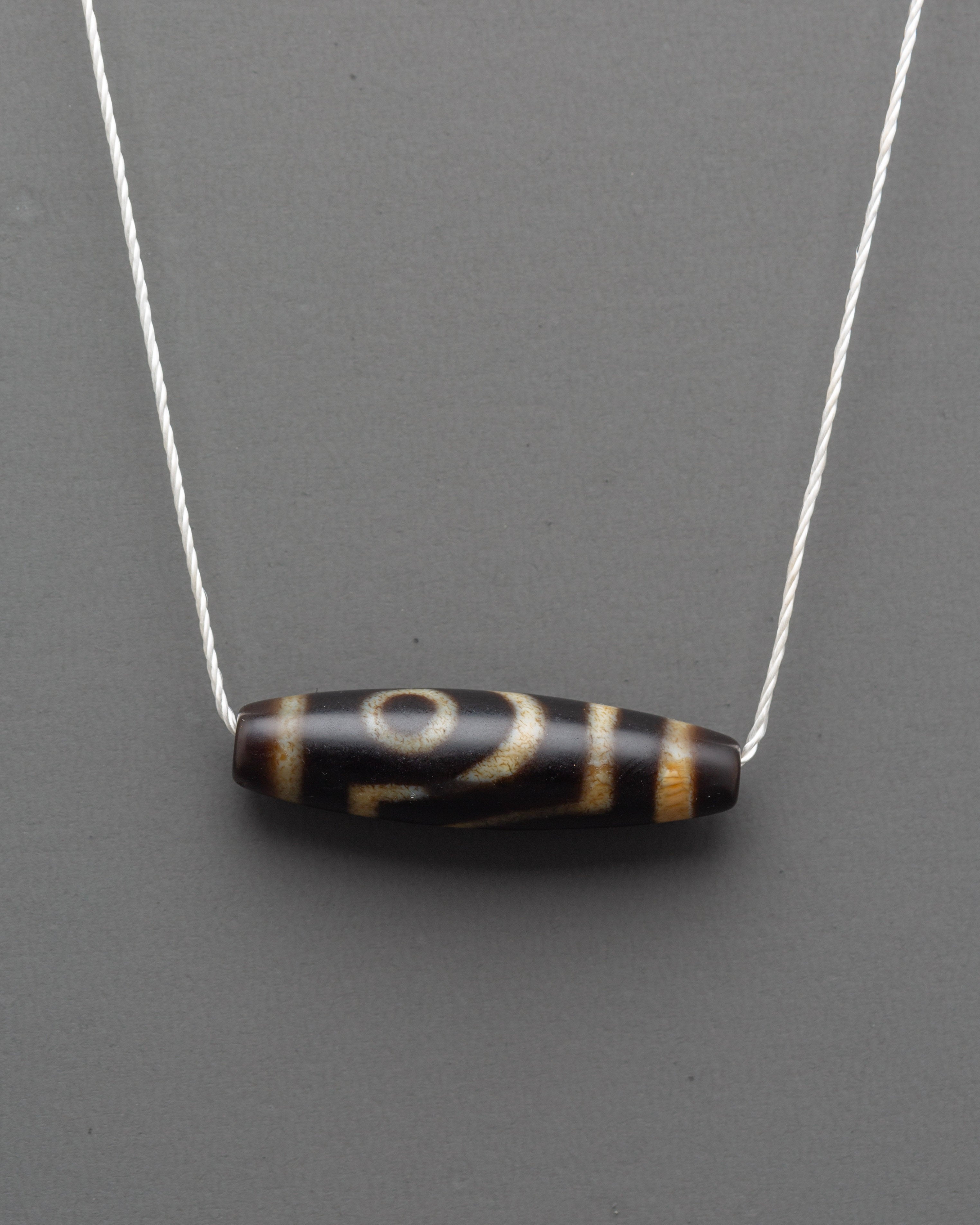 Tibetan Dzi Bead Pendant