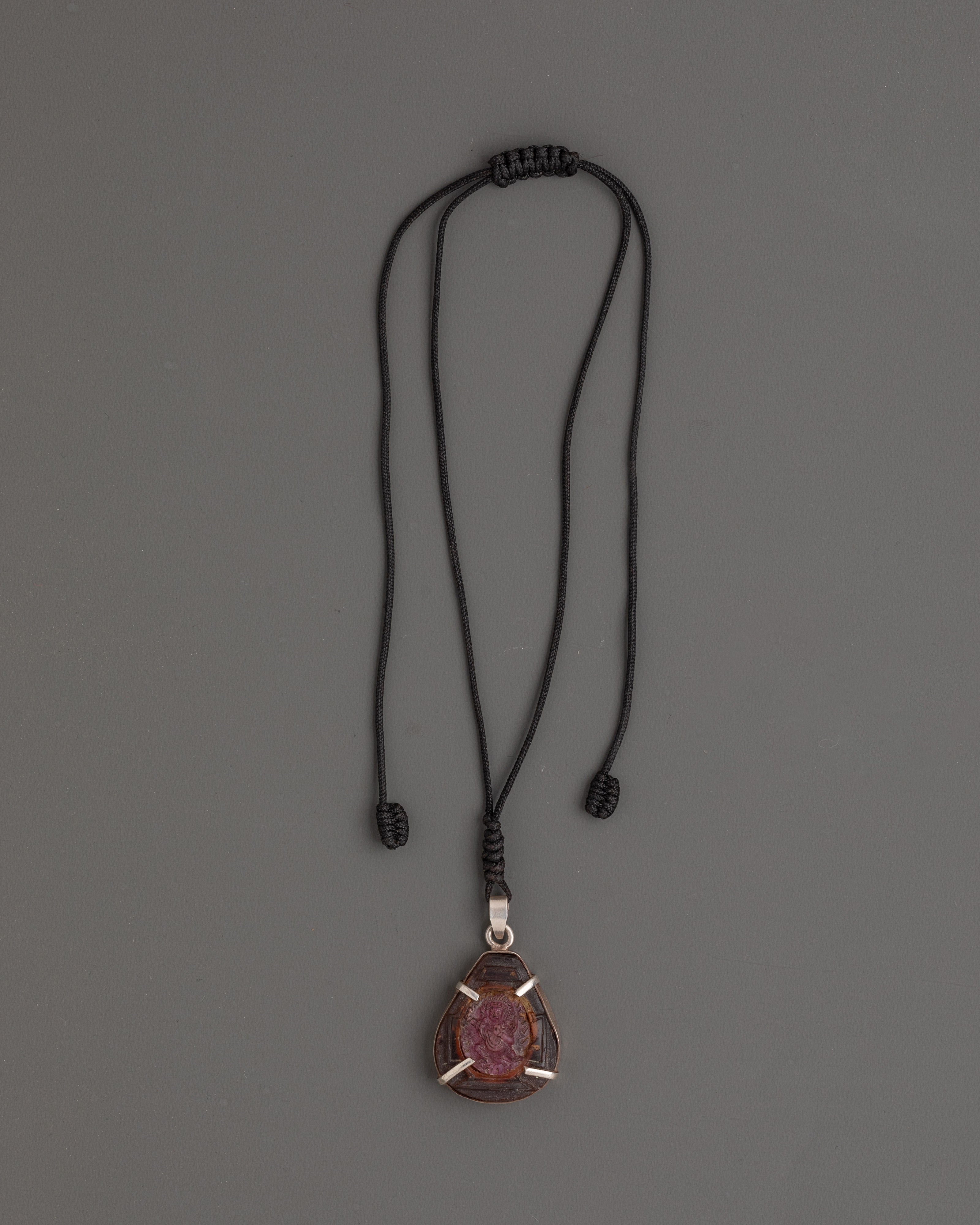 Buddhist Garnet Locket