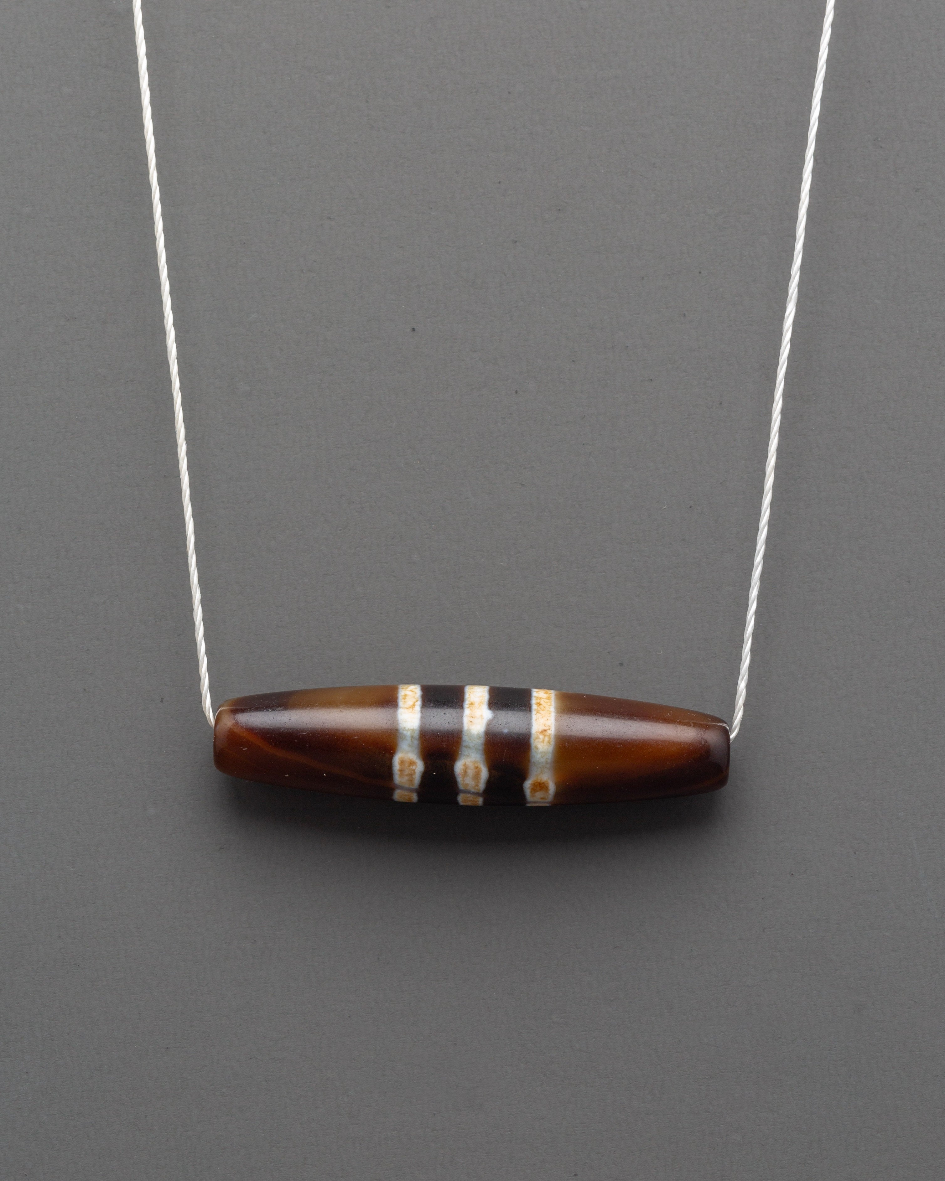 Dzi Bead Jewelry | Sacred Amulet for Protection