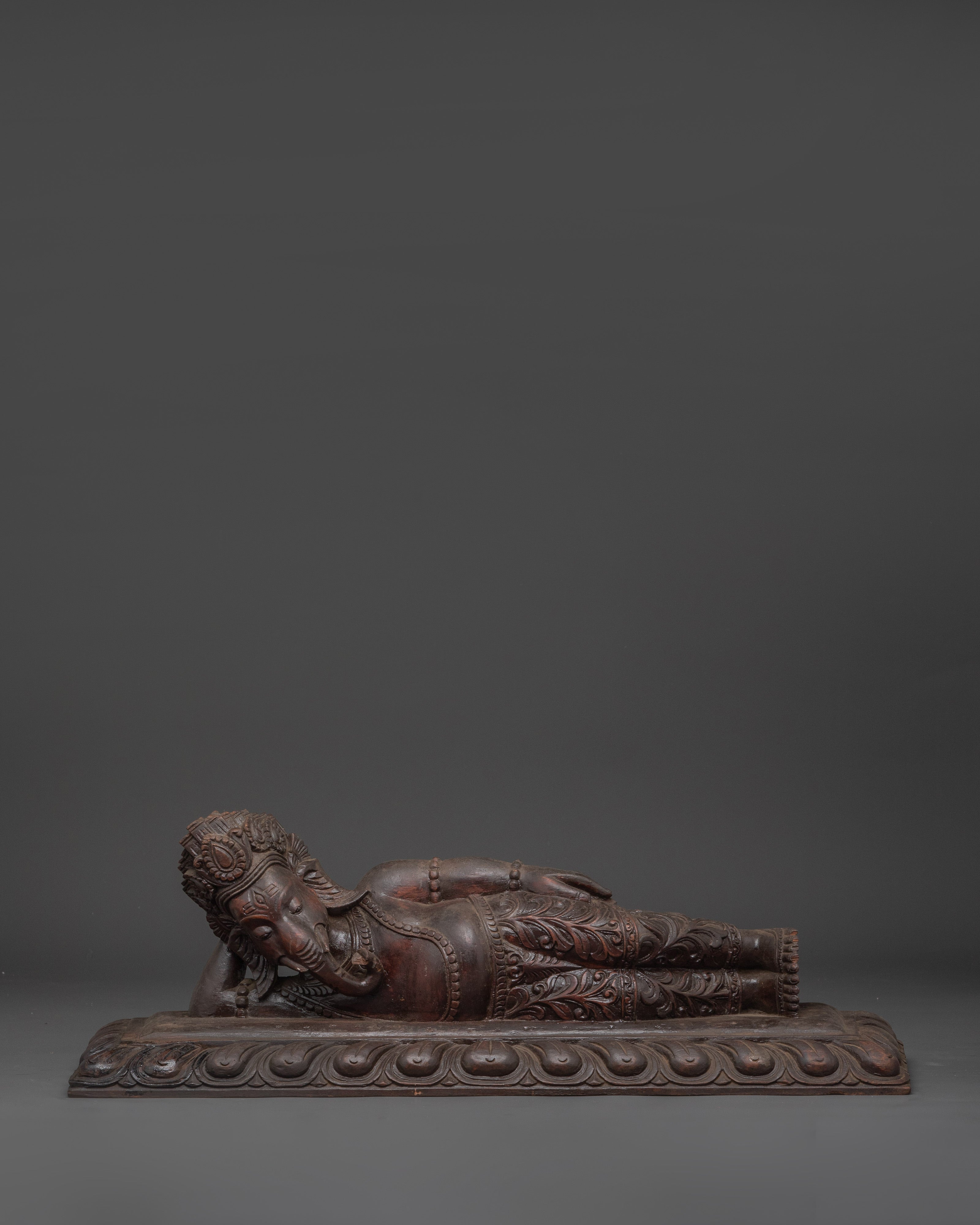 Reclining Ganesha sculpture