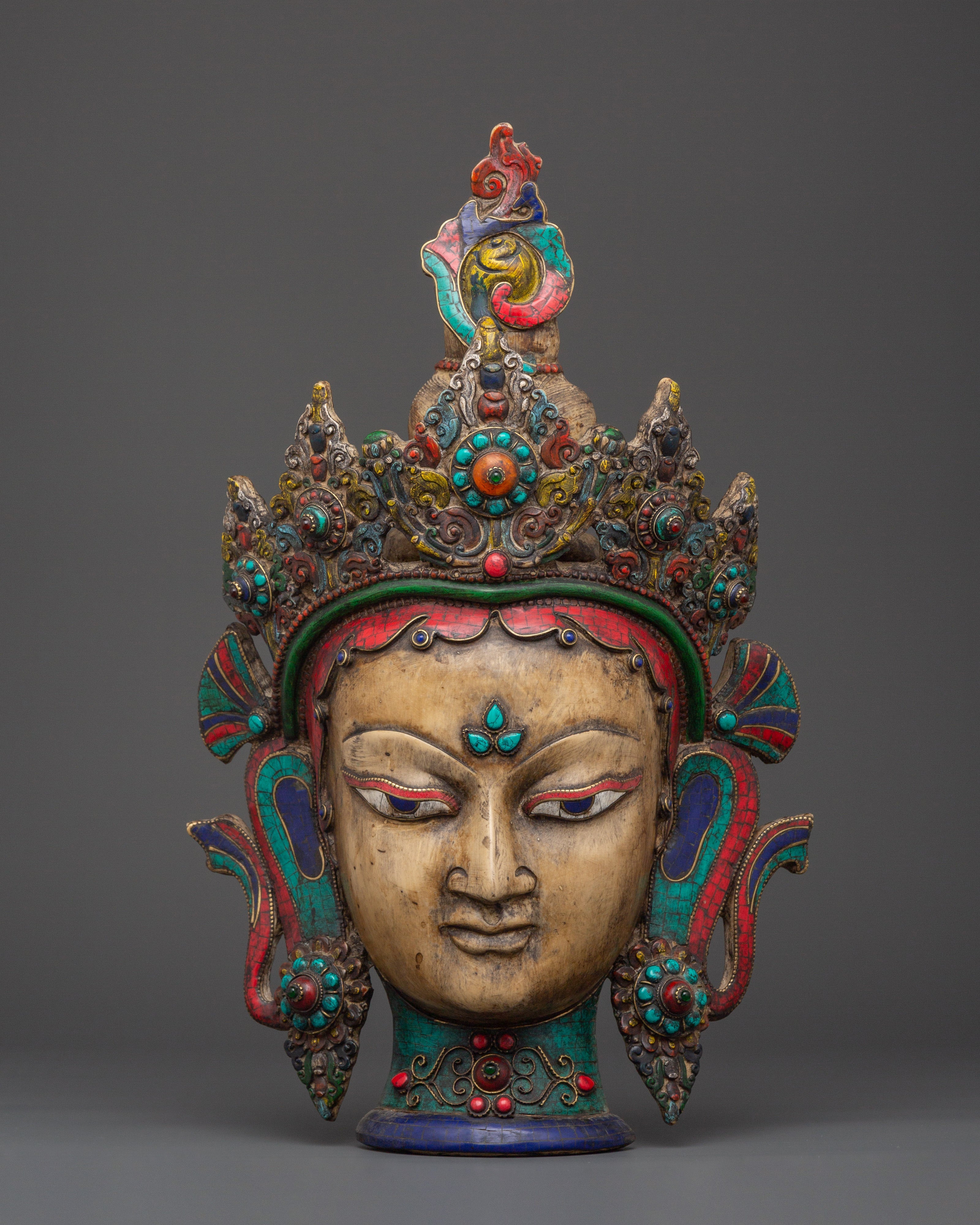 Colorful deity wall hanging mask