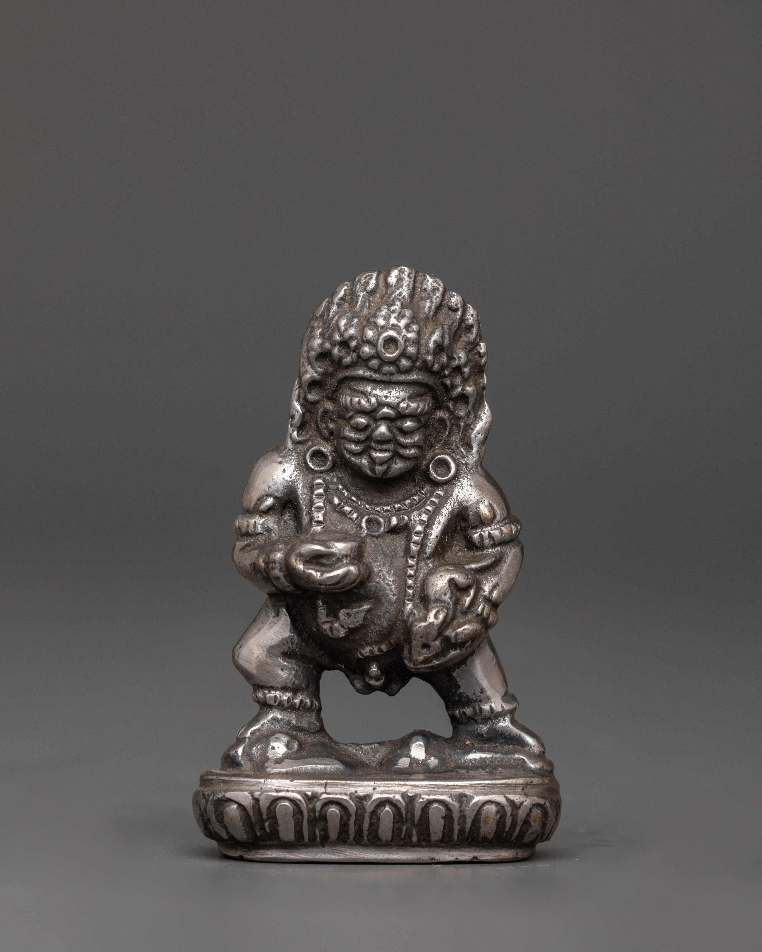 Iron Black Dzambhala statue