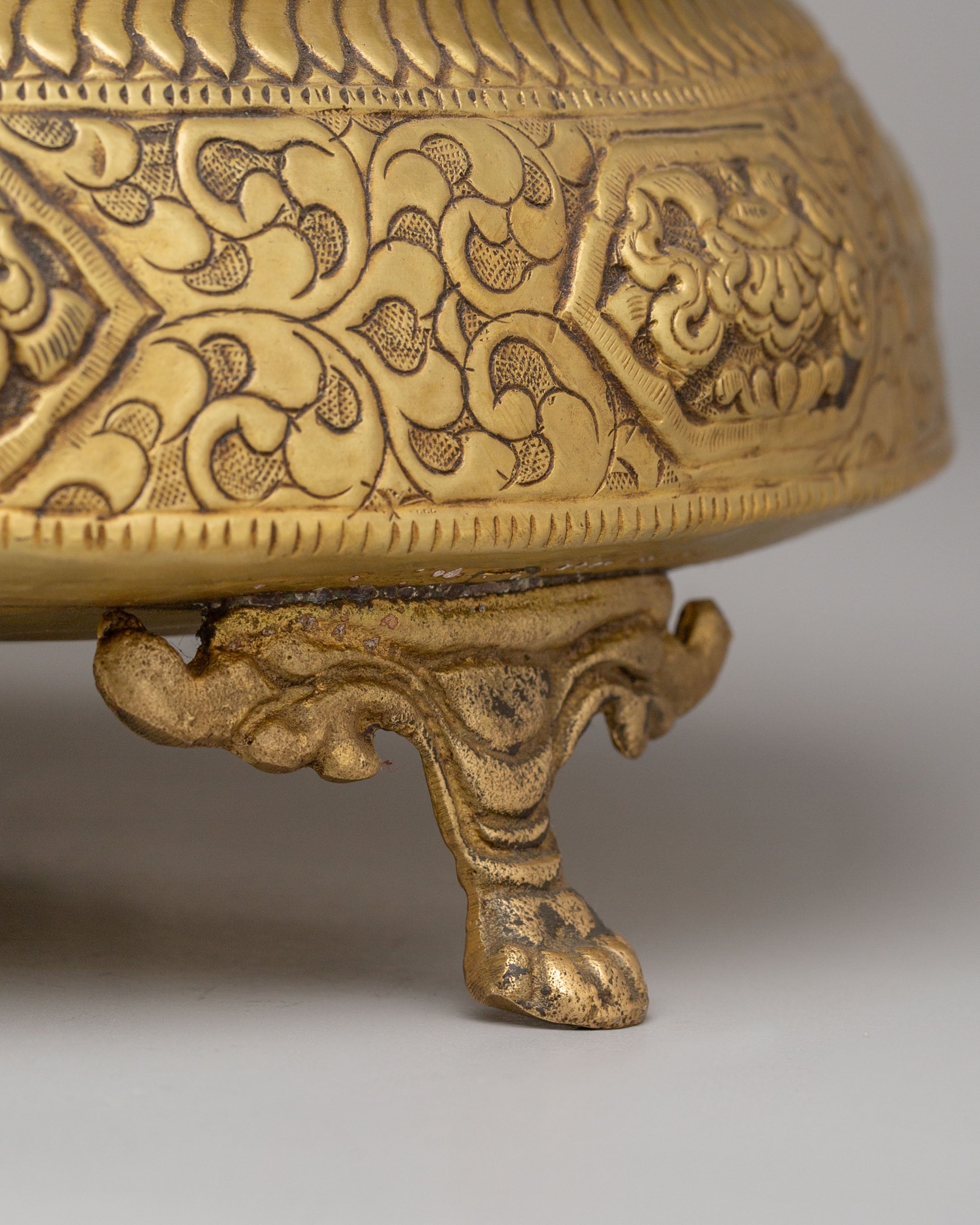 Decorative Urli Bowl | Brass Vessel with Auspicious Symbol Carving