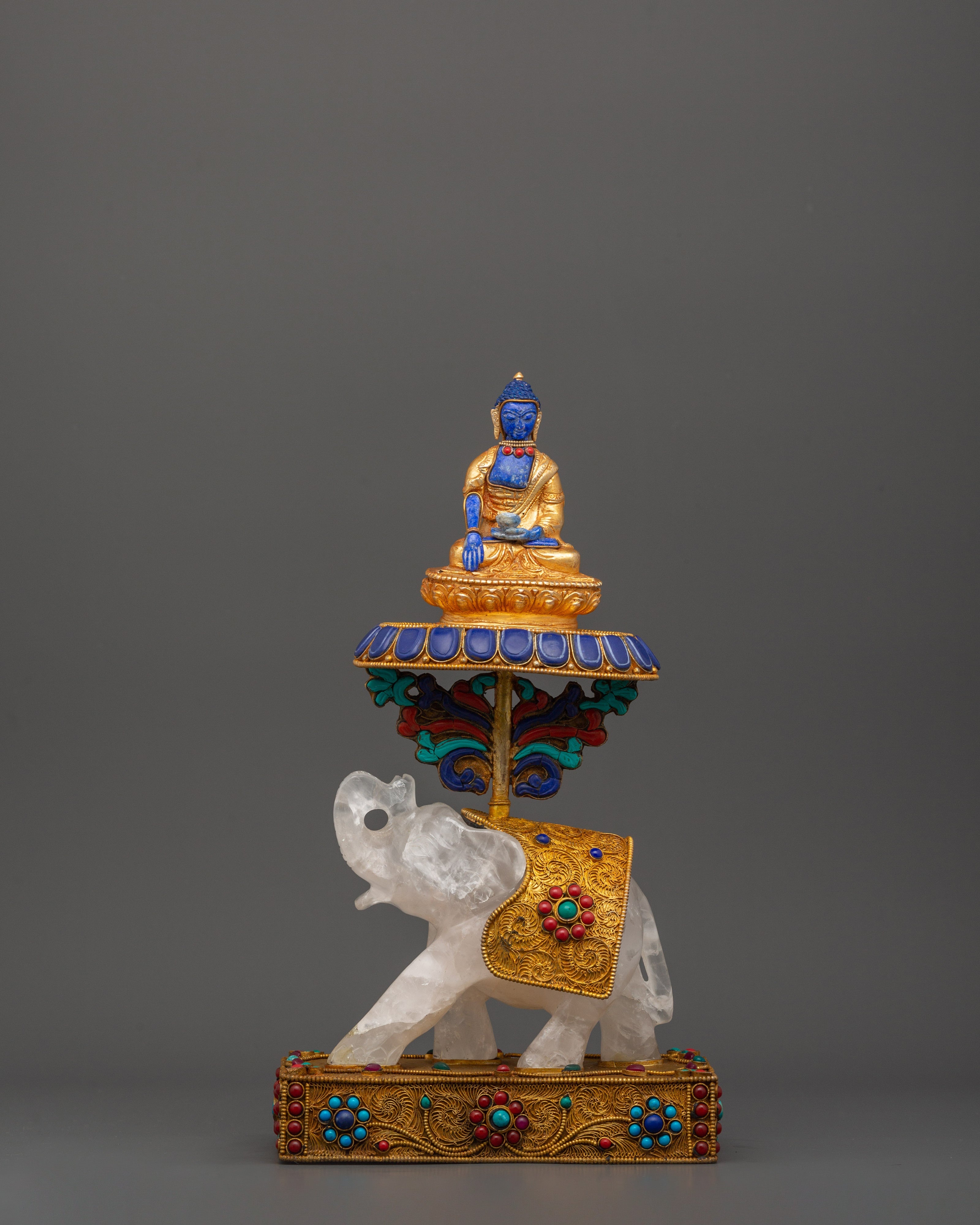 Shakyamuni Buddha on Crystal Elephant | Lapis & Coral Inlaid Gold Statue