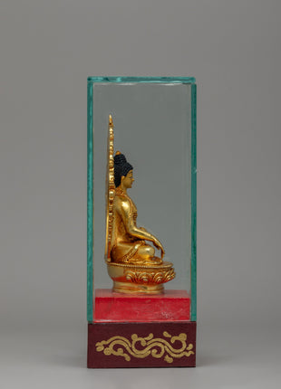 Glass-Enclosed Shakyamuni Buddha Statue | Meditative Lotus Pedestal Figure