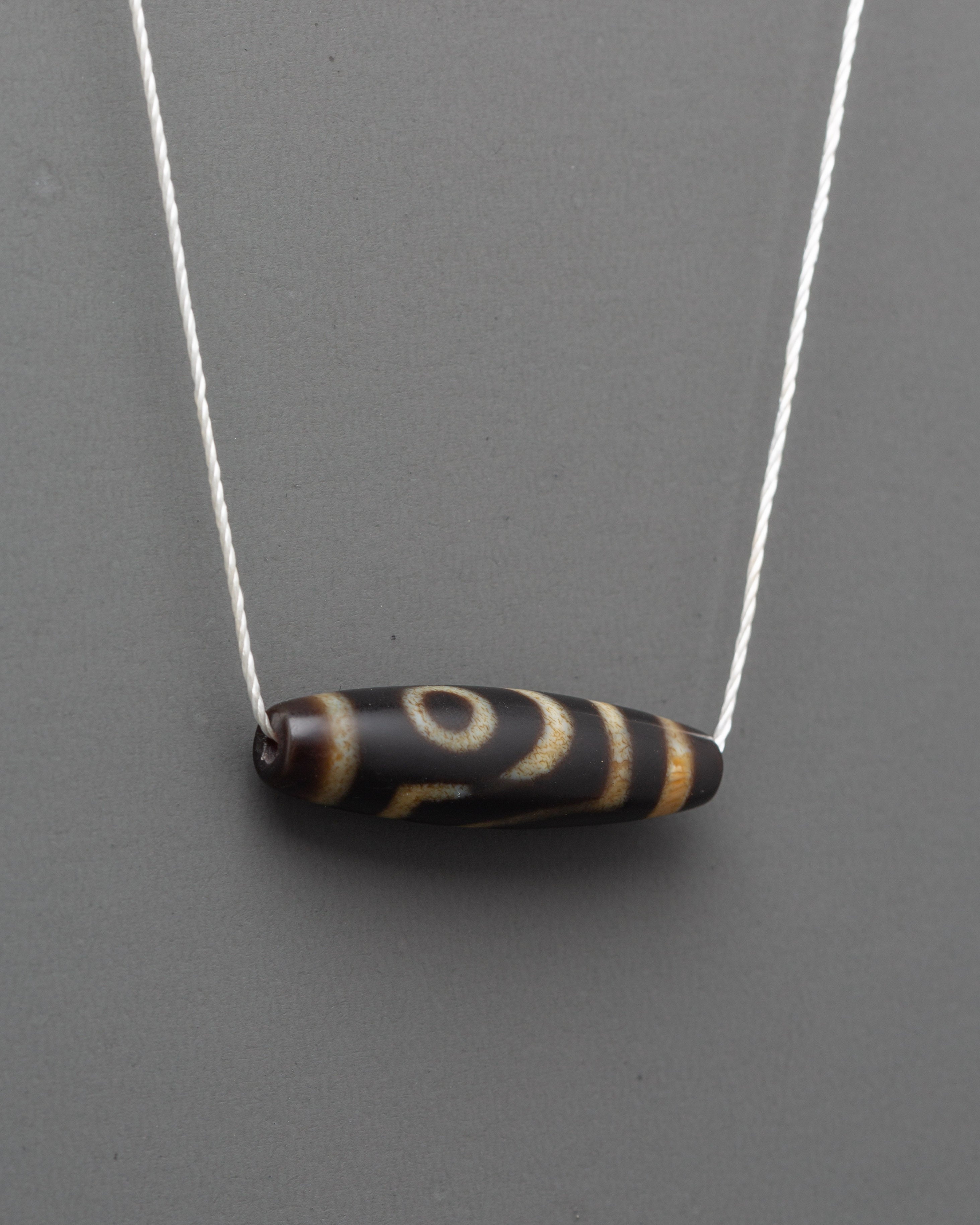 Handmade Tibetan Dzi Bead Pendant | Sacred Tibetan Amulet for Protection & Prosperity