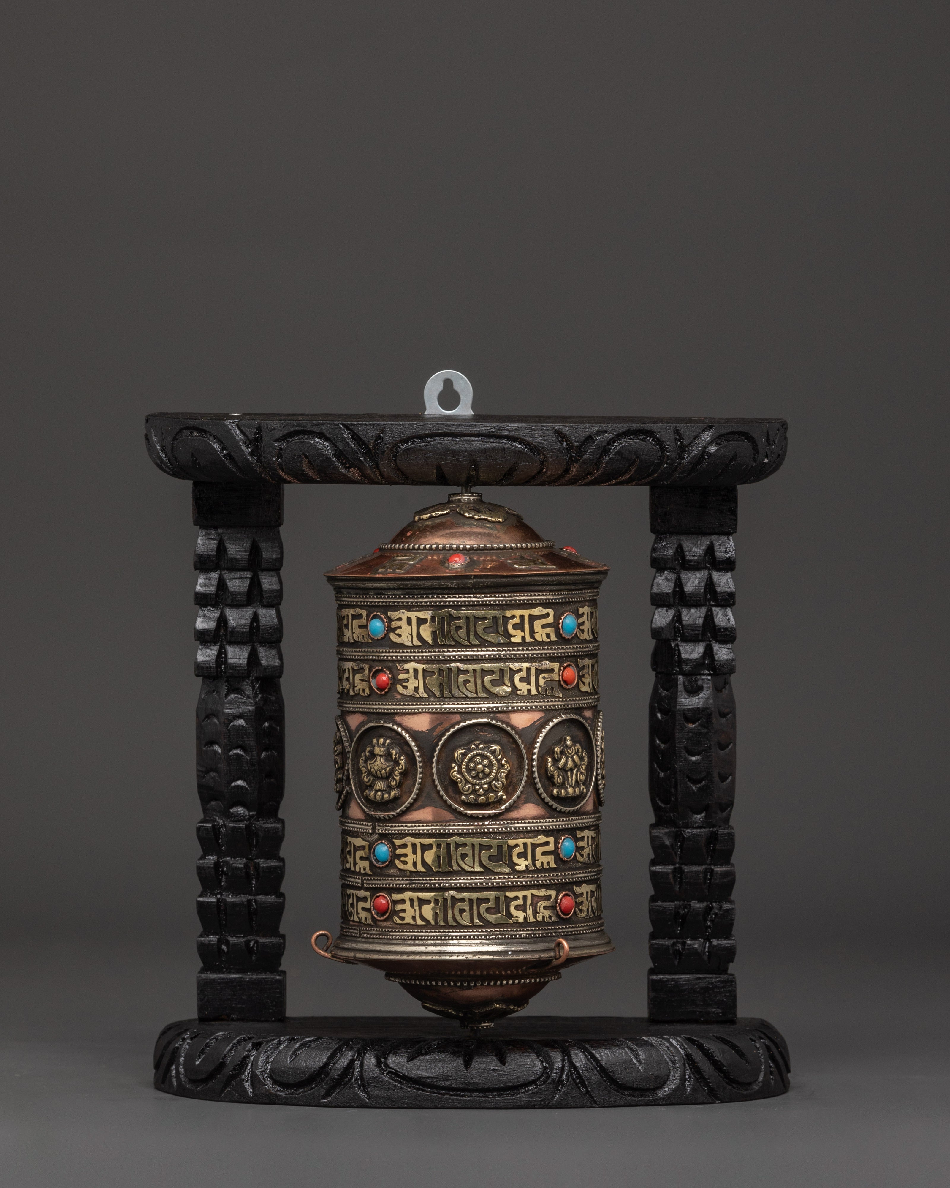 prayer-wheel-featuring-buddhist-auspicious-symbols