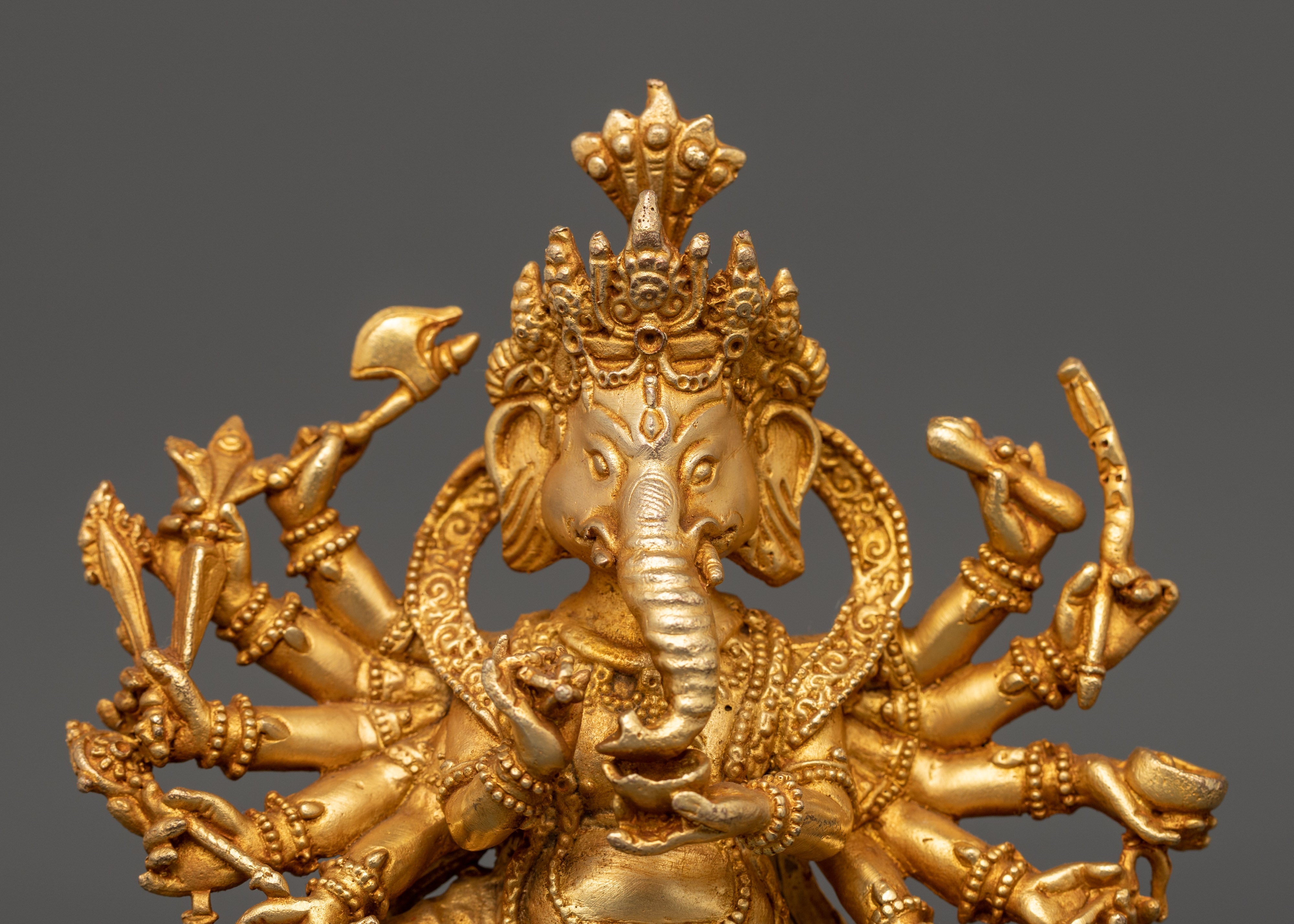 Ganesha Statue with One Leg Raised & Multiple Arms | Ganapati in Copper