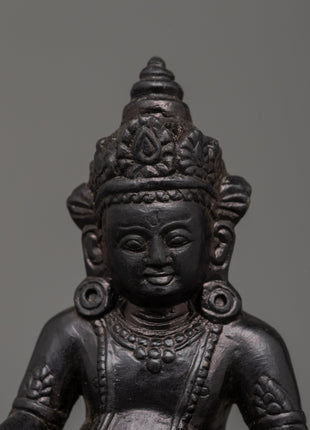 Dzambhala Oxidized Stone Statue | A Symbol of Wealth