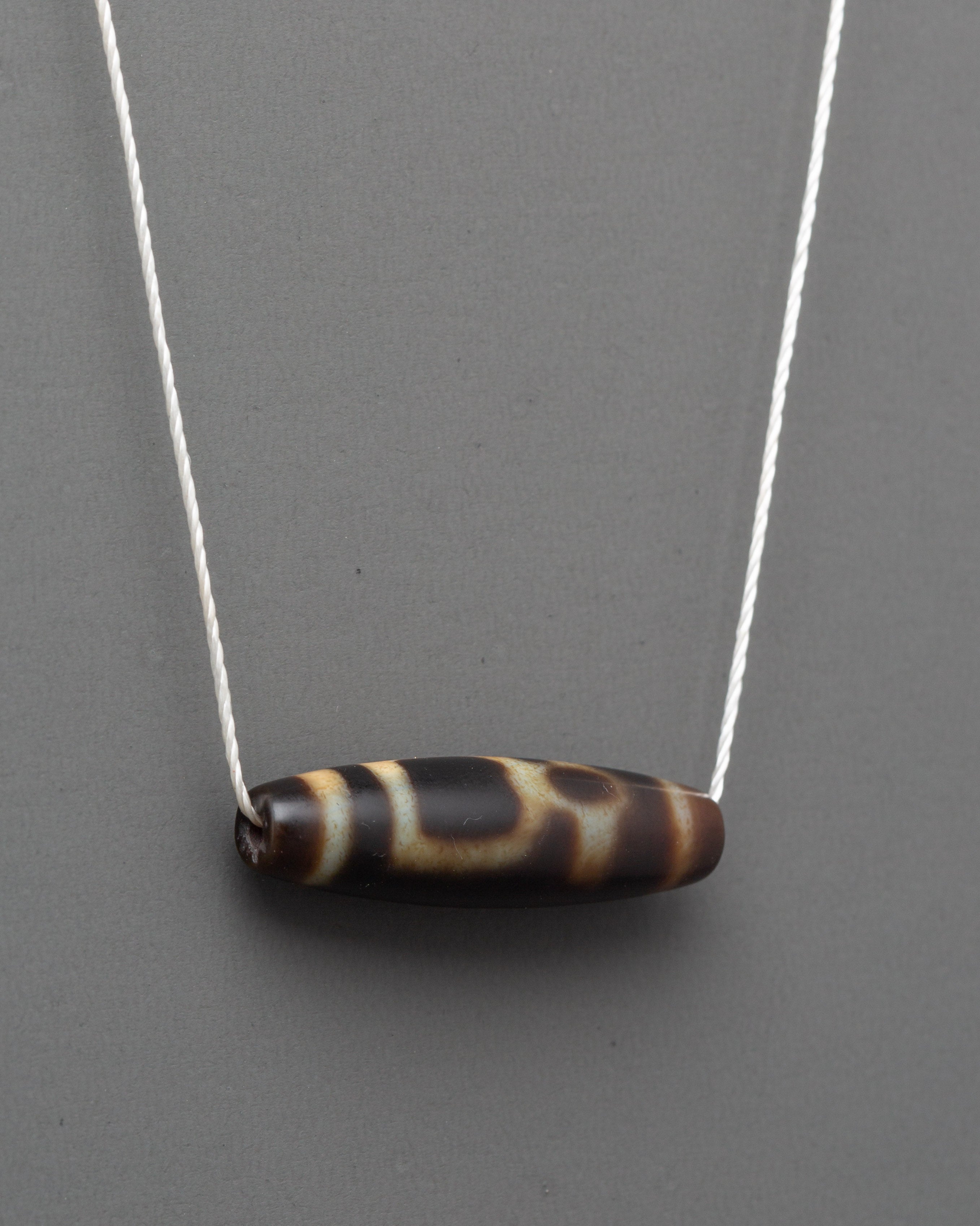 Tibetan Spiritual Protection Pendant | Authentic Tibetan Dzi Bead Jewelry
