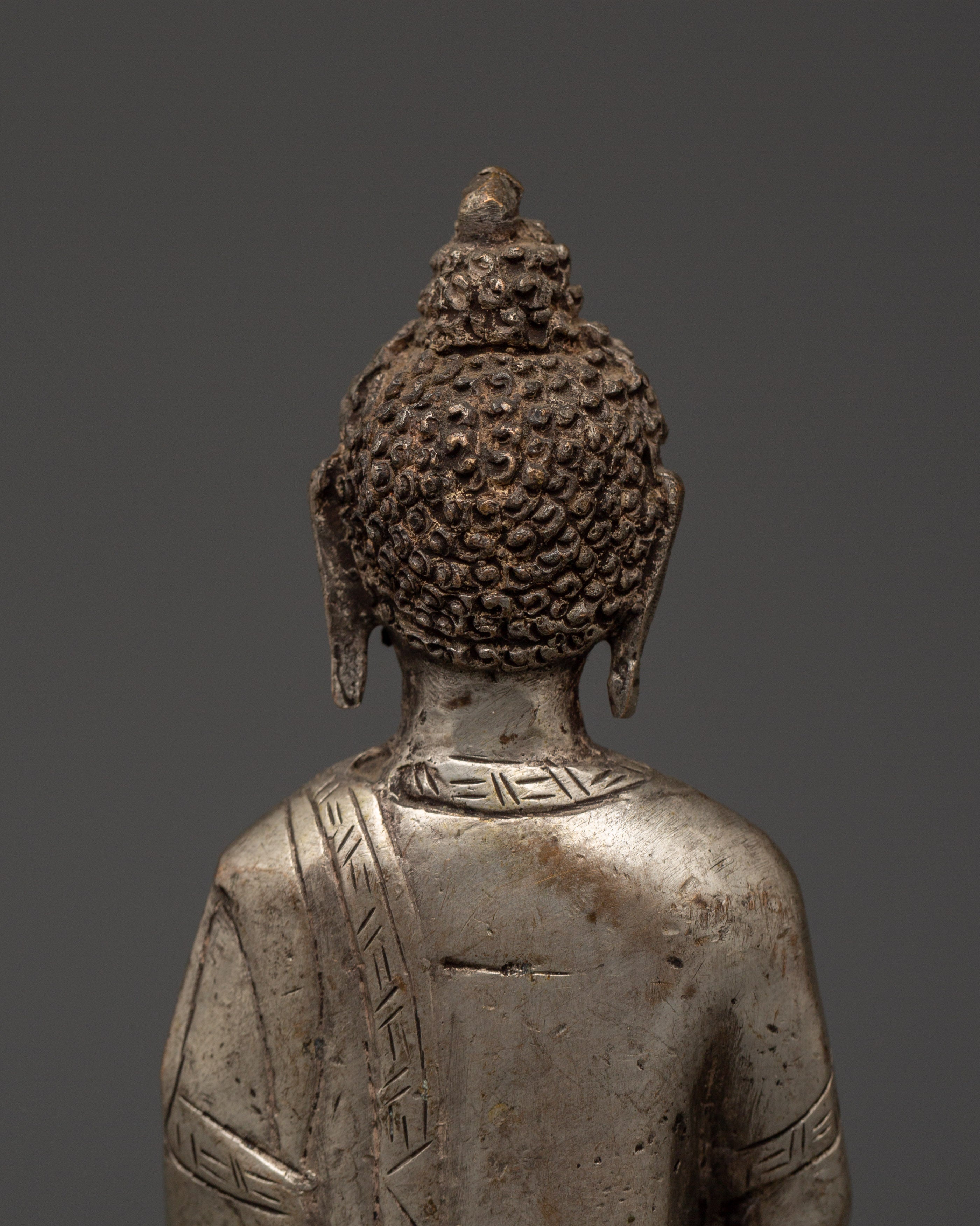 Handmade Amoghasiddhi Buddha Statue | Silver-Plated Copper Body