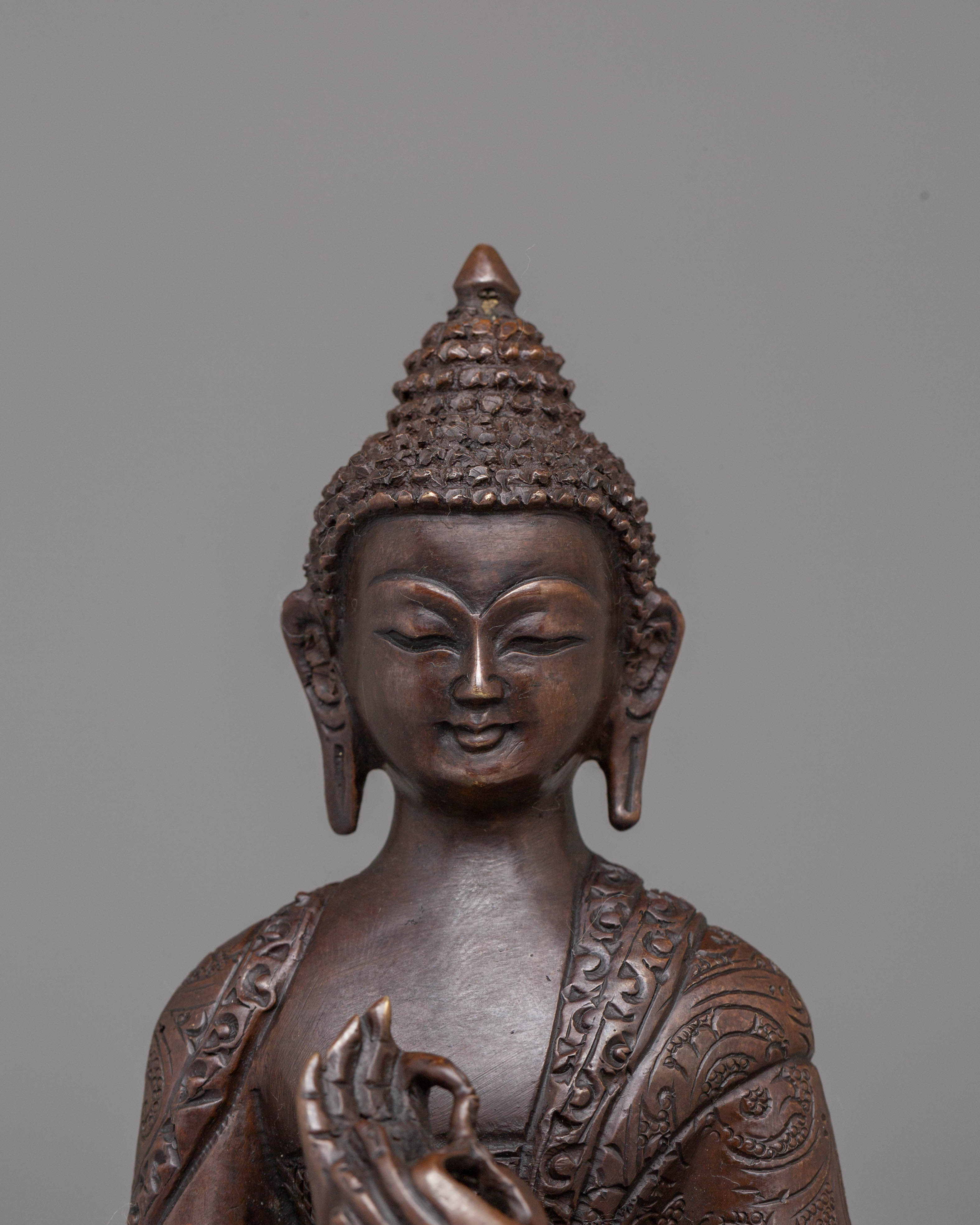 Oxidized Copper Handcrafted Vairocana Sculpture: Cosmic Buddha