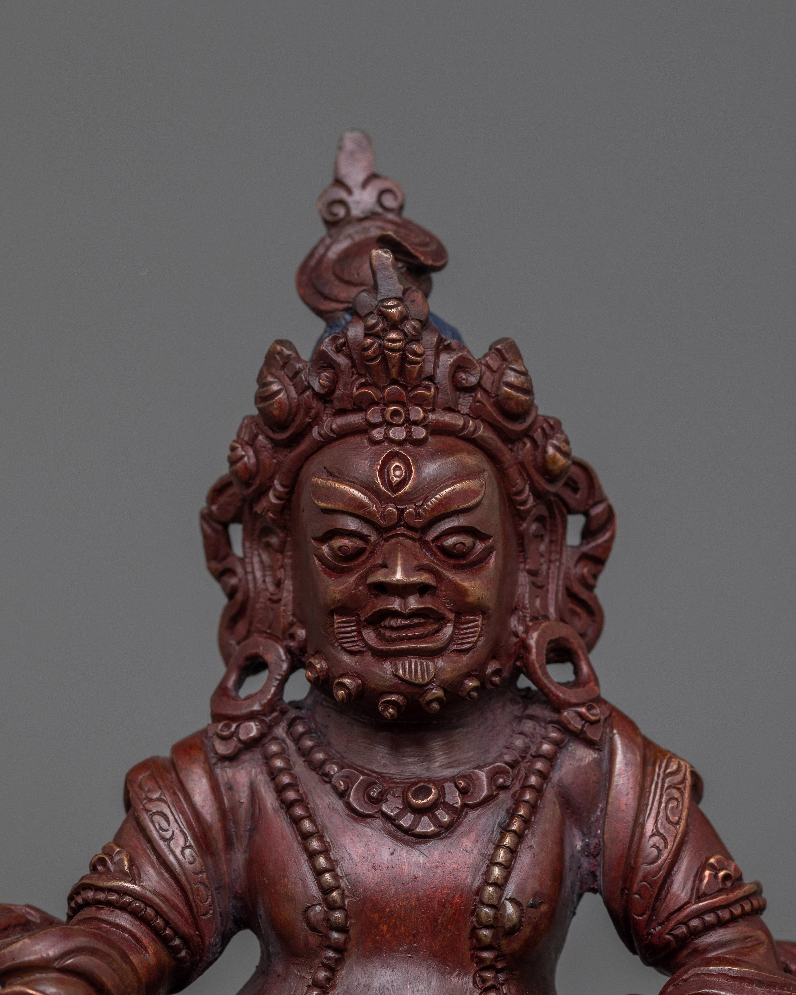 Dzambhala with Oxidized Copper Body Statue | The Embodiment of Prosperity