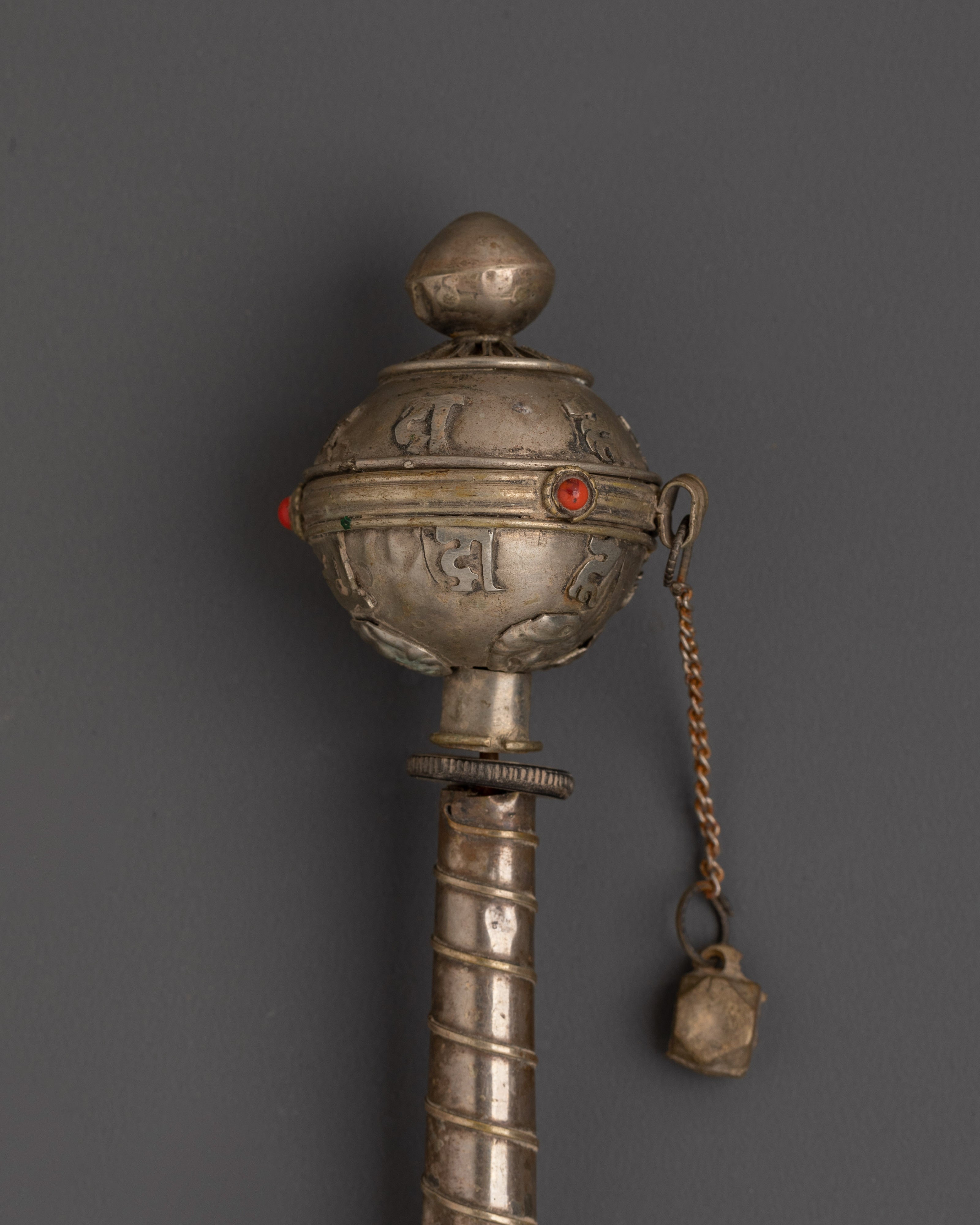 Handcrafted Buddhist Sacred Prayer Wheel | White Metal with Coral Inlays