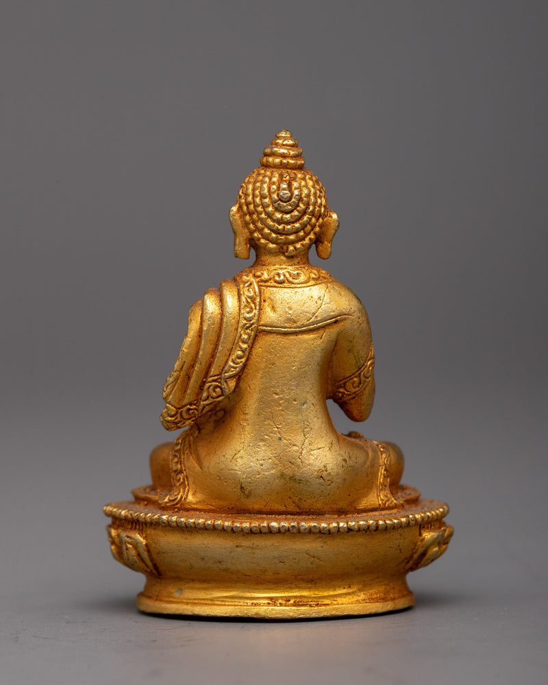 Machine-Made Copper Amoghasiddhi Buddha Statue | Symbolizing Spiritual Attainment