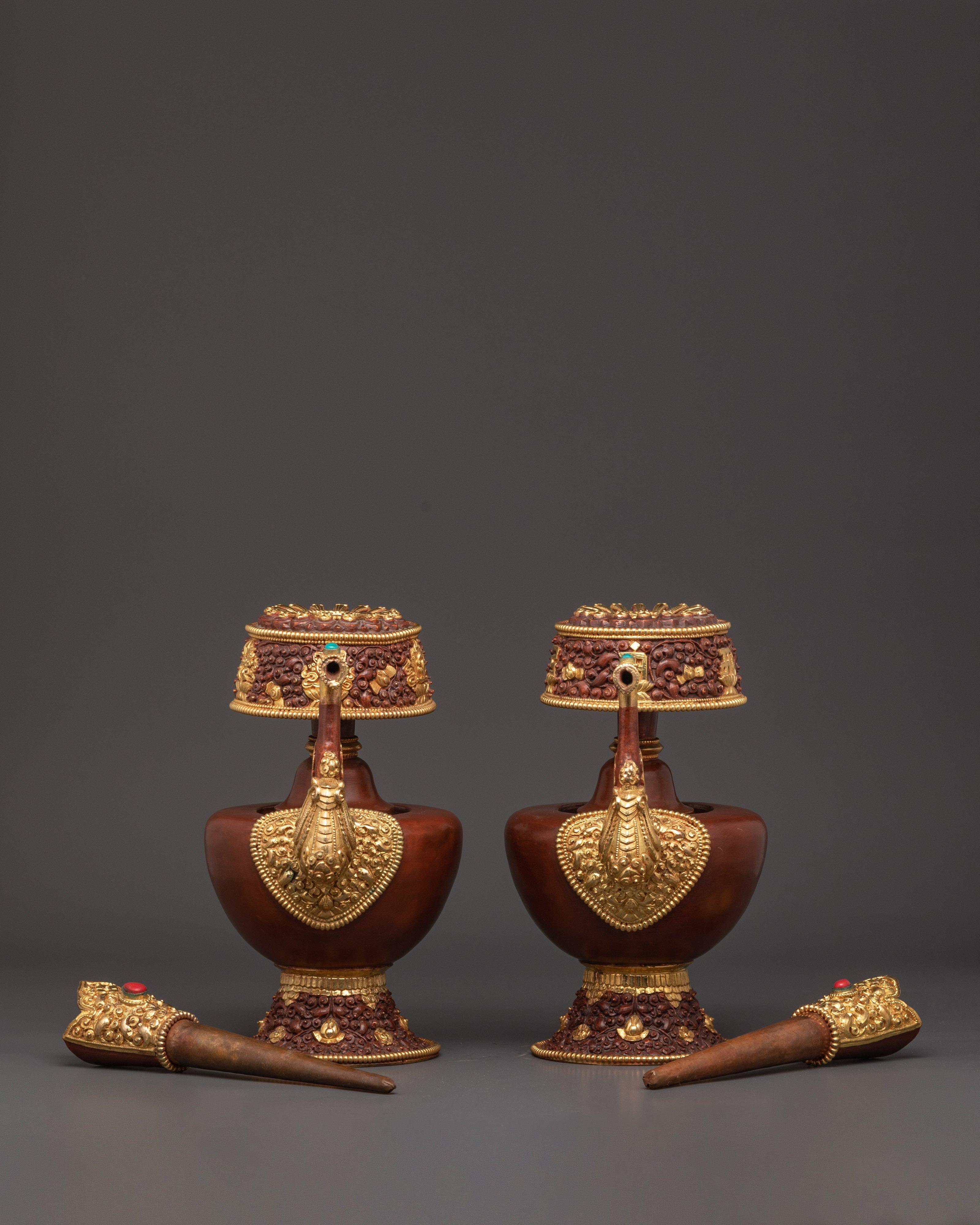 Pair of Tibetan Bhumba Vases | Gold-Plated Copper Vessels with Coral Inlay