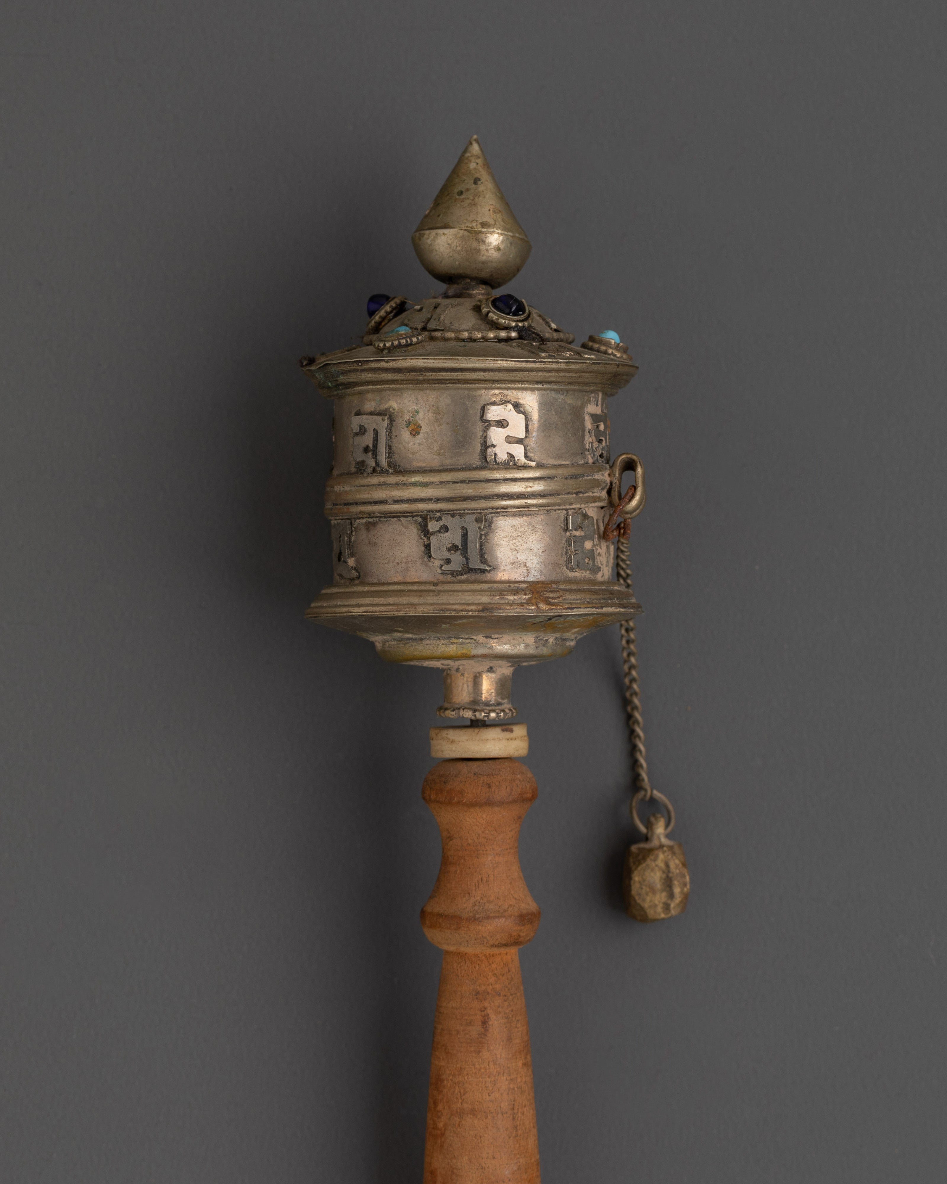 Sacred Buddhist Spinning Mantra Wheel | Wooden Handle, White Metal, and Turquoise Stones