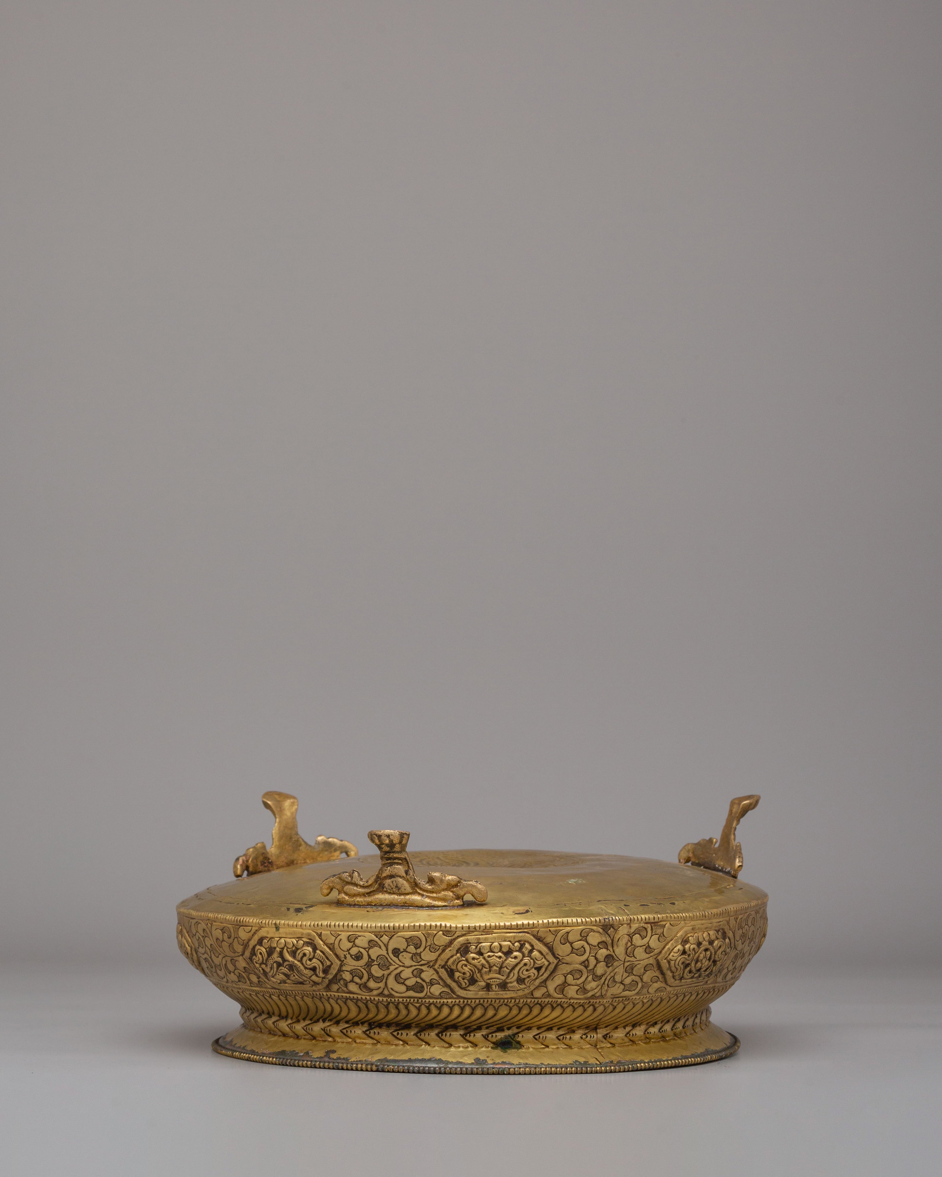 Decorative Urli Bowl | Brass Vessel with Auspicious Symbol Carving
