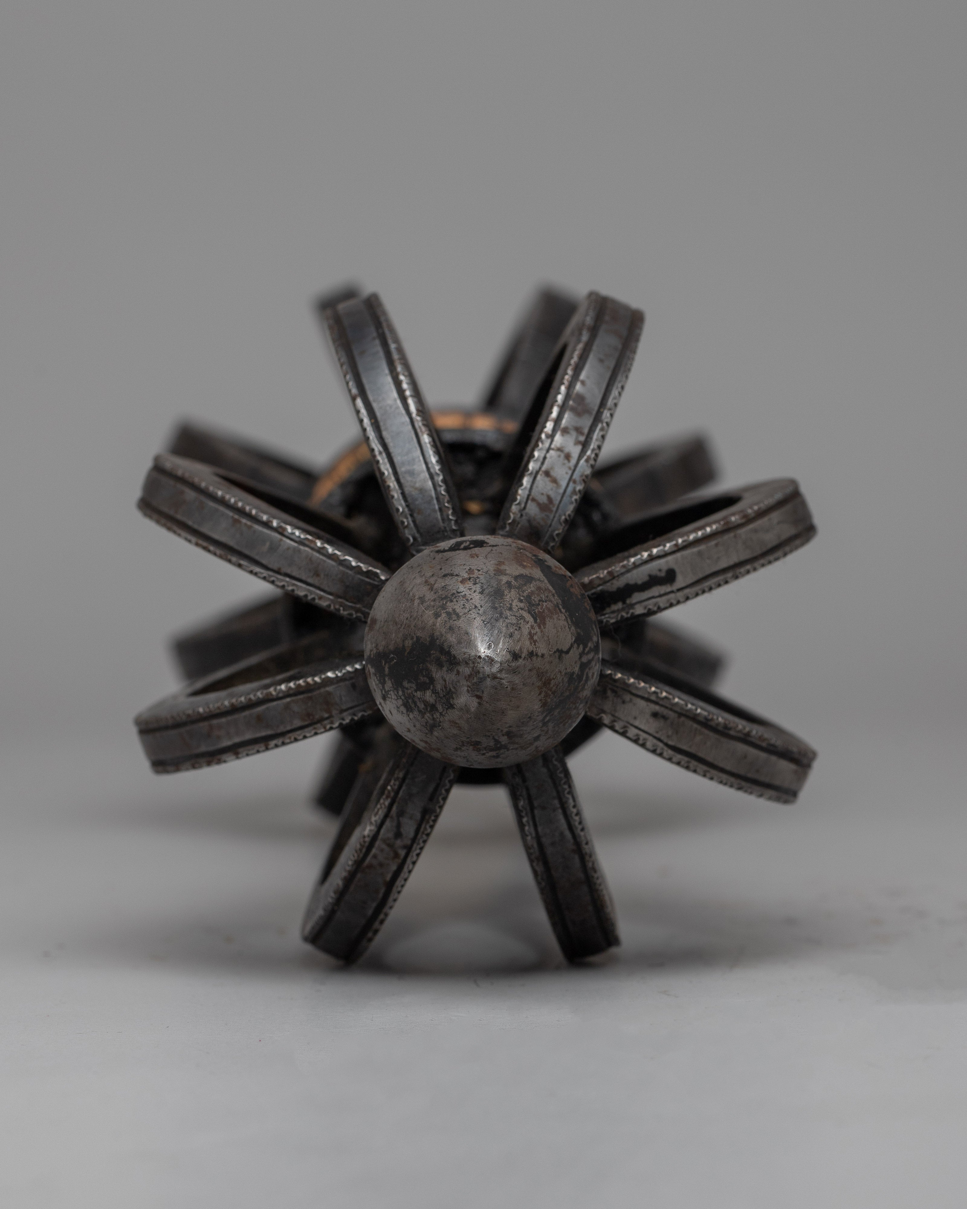 Tibetan Vajra on Wooden Stand | Fusion of Spiritual Symbolism and Natural Elegance