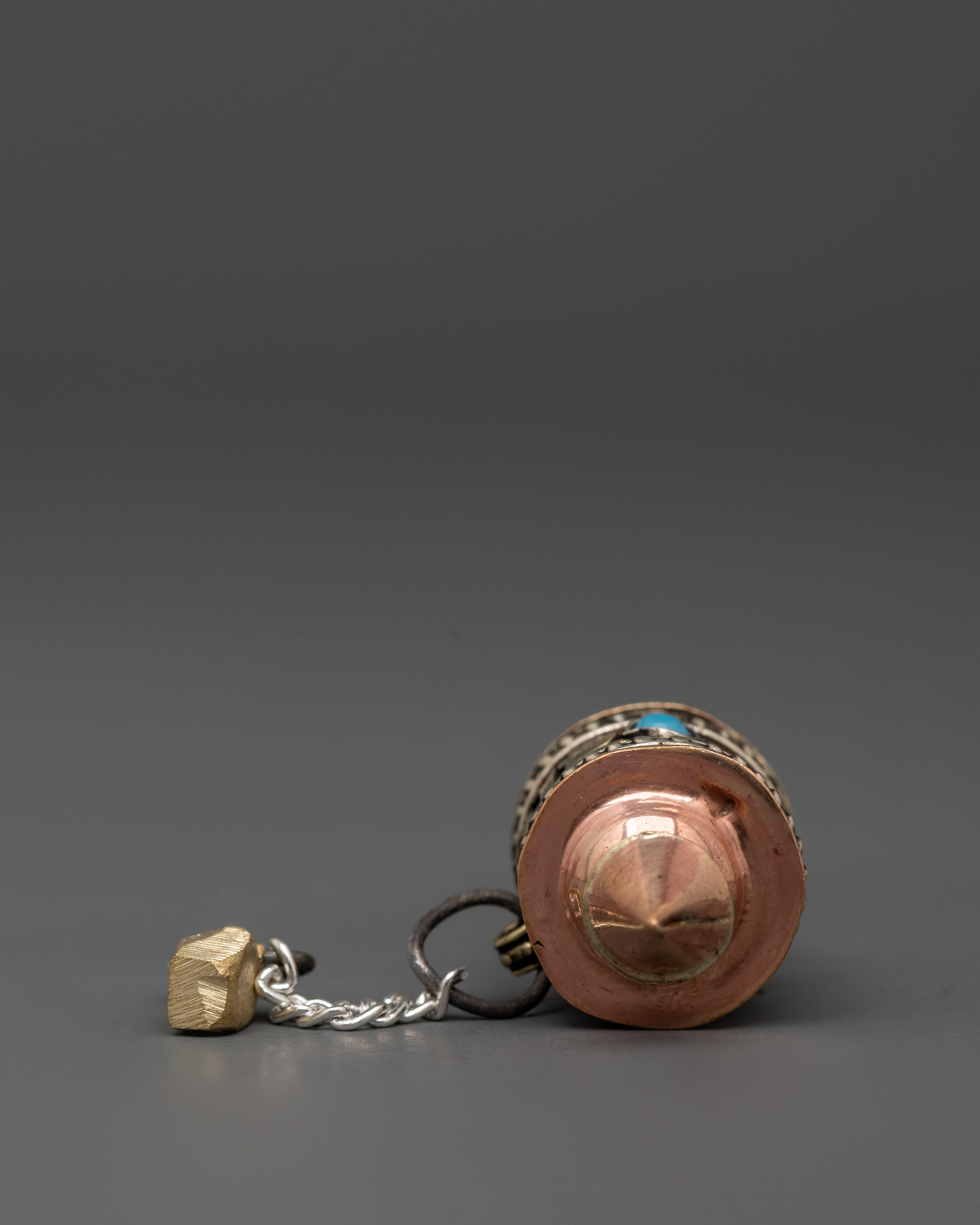 Handheld Tibetan prayer wheel in copper | Mindfulness & Spiritual Practice