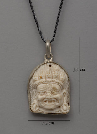Hand-Carved Bhairav Locket with Five-Skull Crown | Buffalo Bone & White Metal