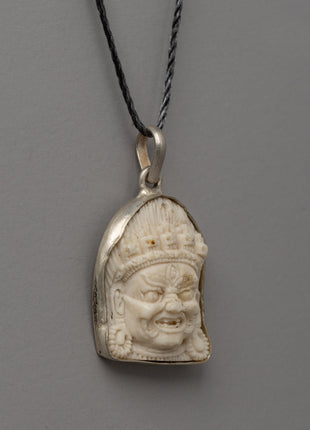 Hand-Carved Bhairav Locket with Five-Skull Crown | Buffalo Bone & White Metal