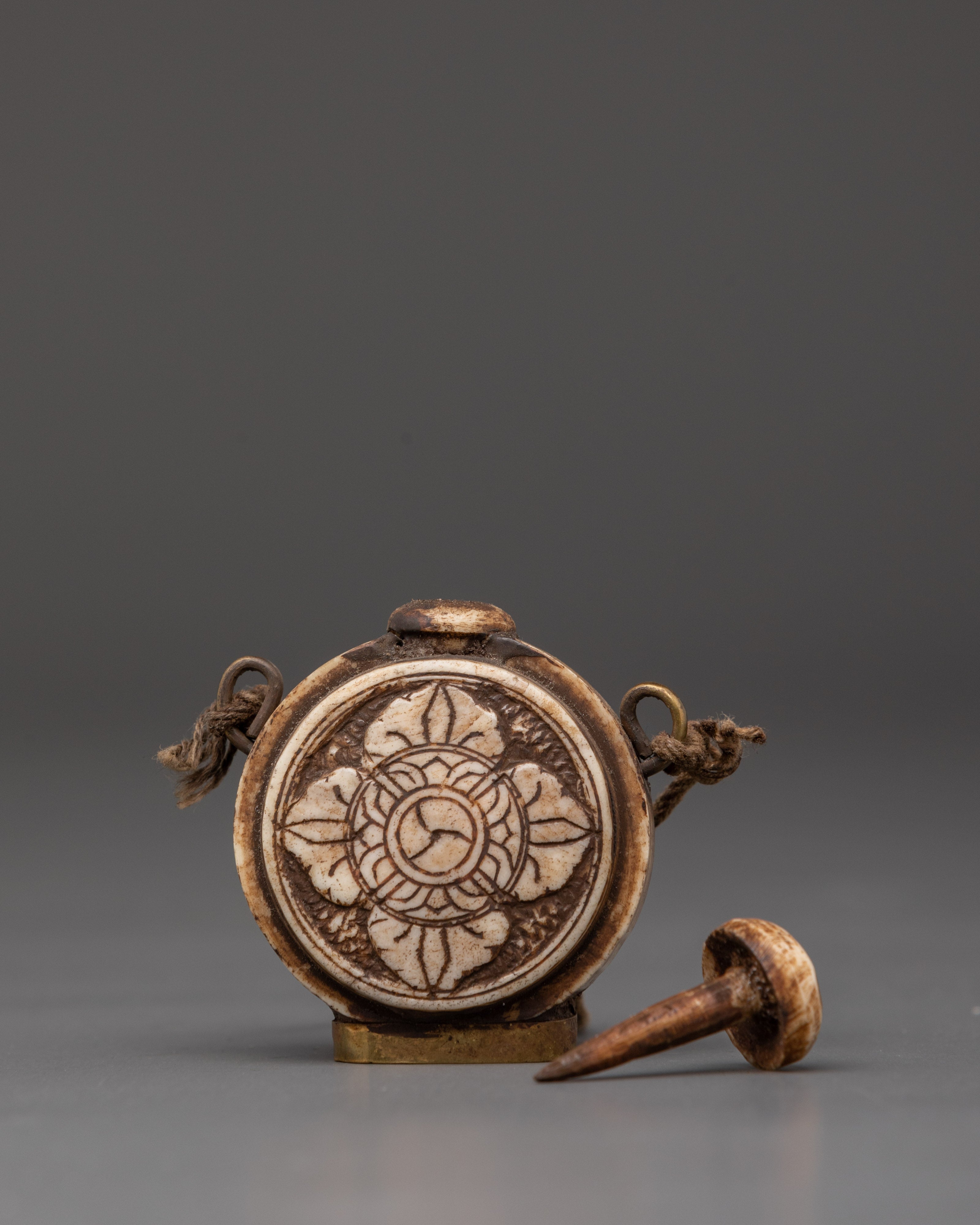 Tibetan Ritual Snuff Bottle in Carved Buffalo Bone