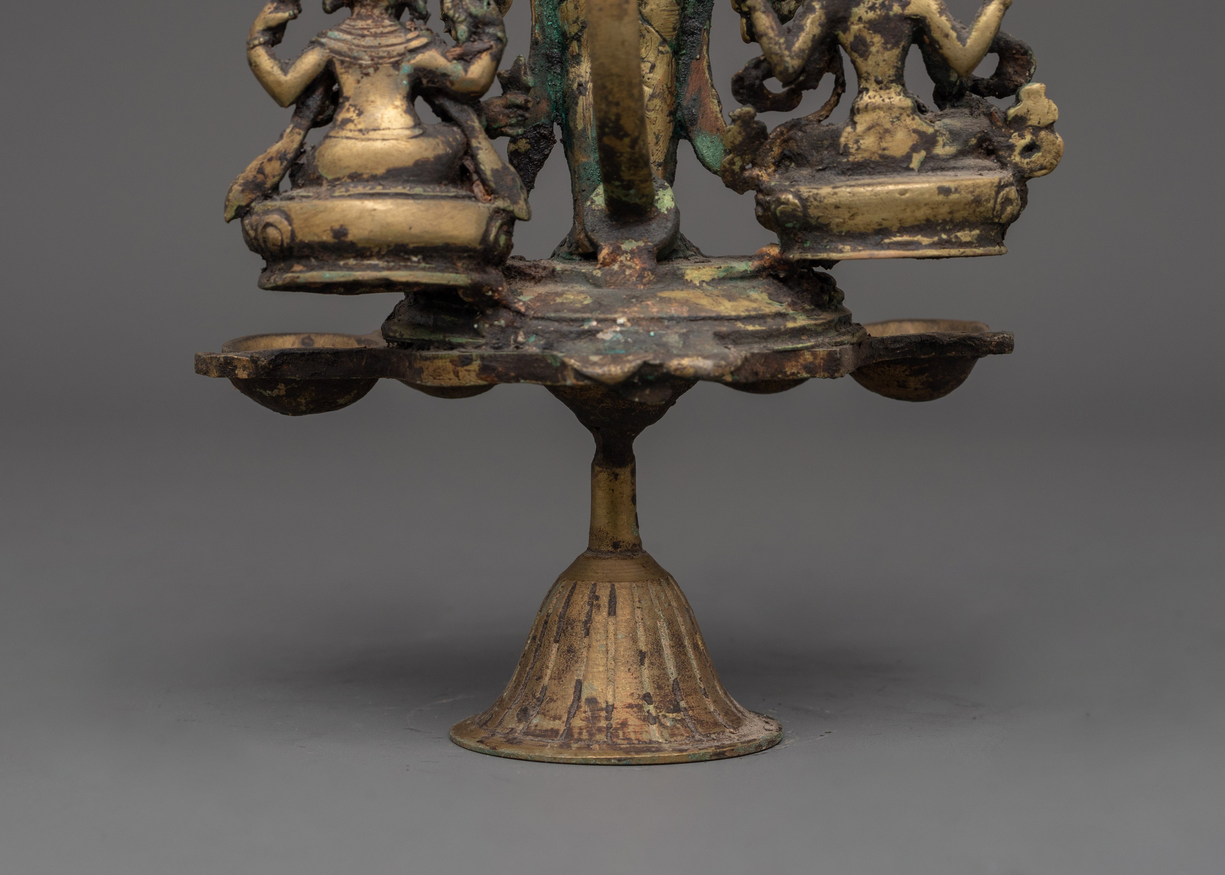 Brass Oil Lamp - Decorated with Avalokiteshvara, Vasudhara & Ganesh