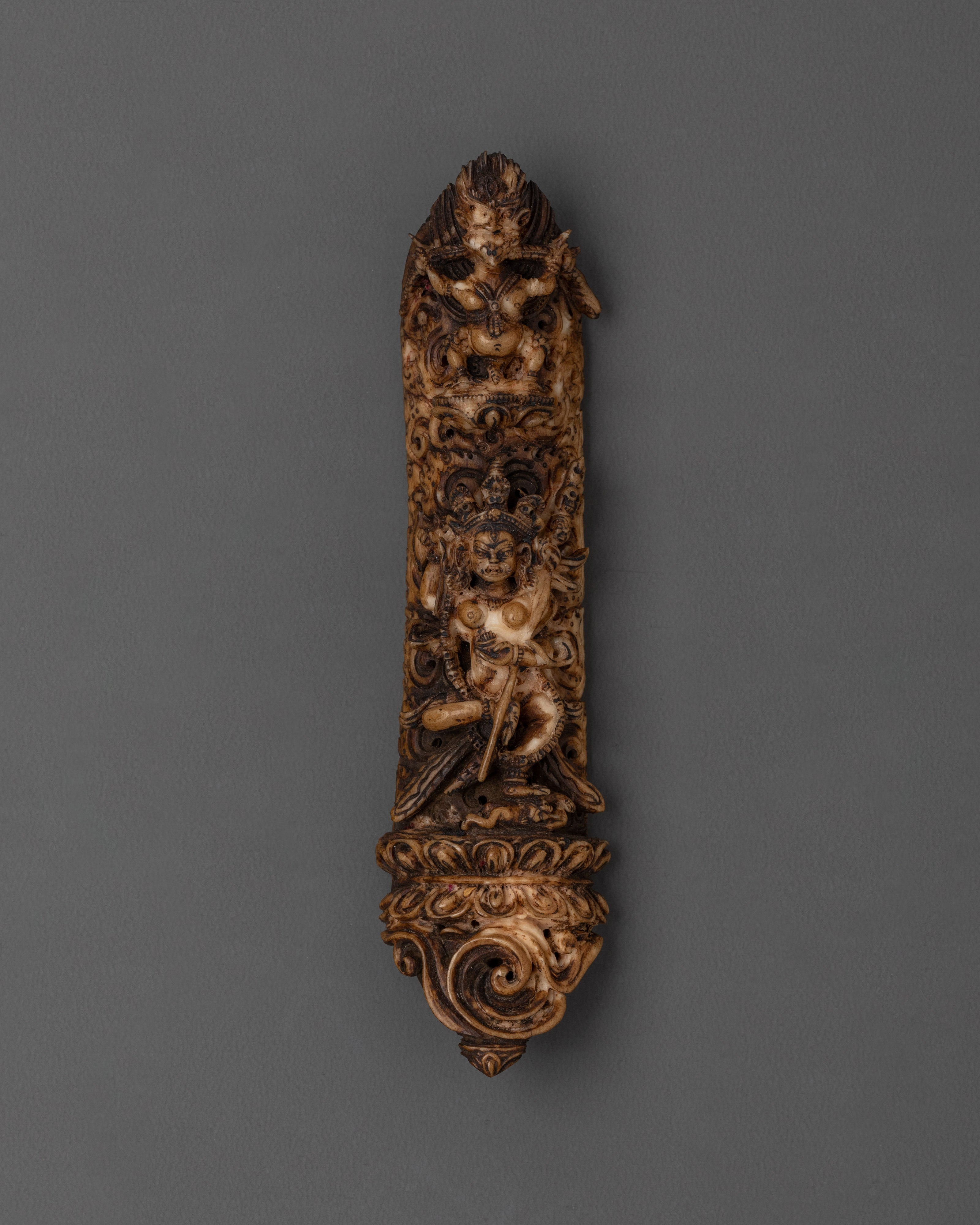 Sacred Bone Carving with Divine Deities