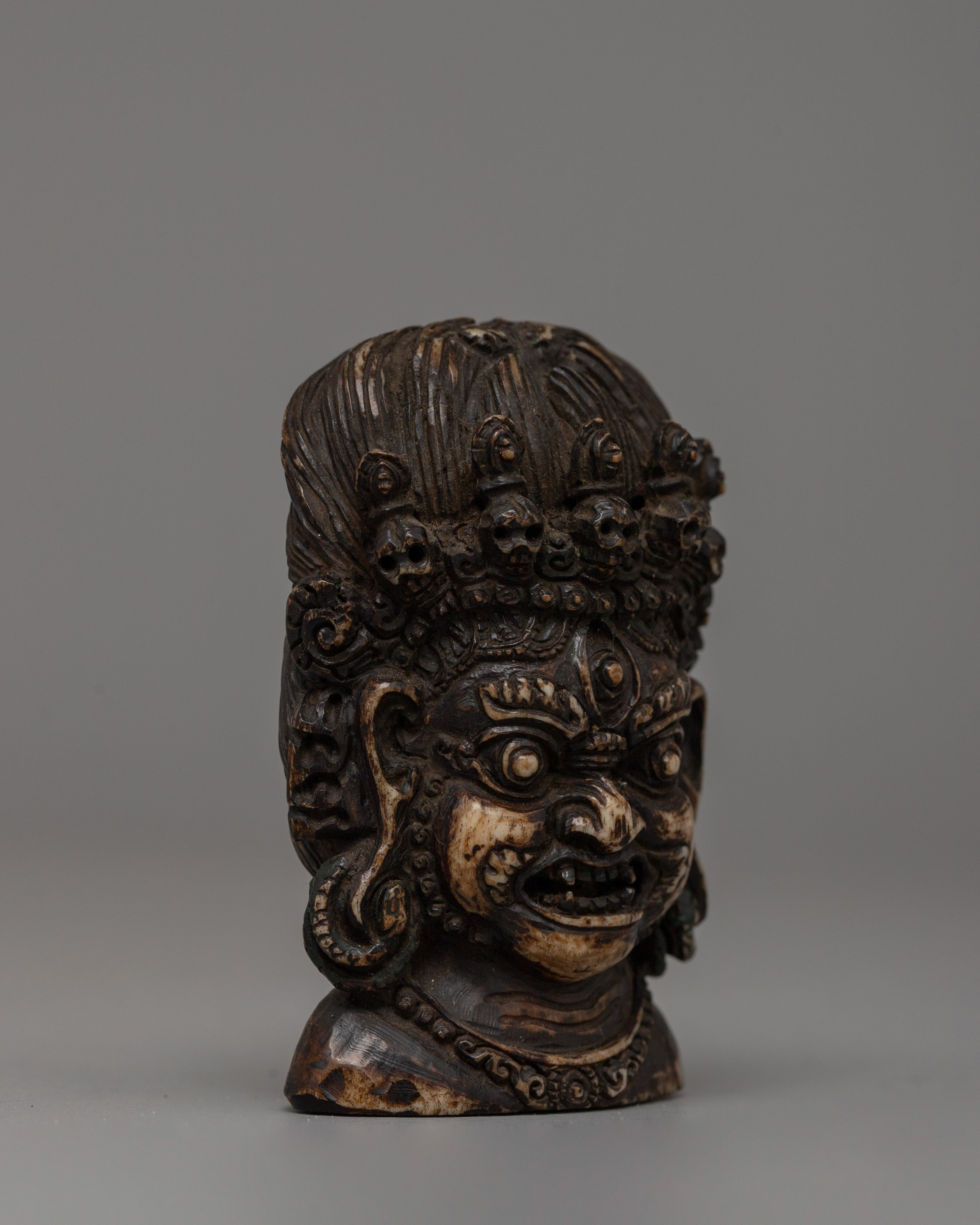 Bhairava Head Carving | Handcrafted Buffalo Bone Sculpture