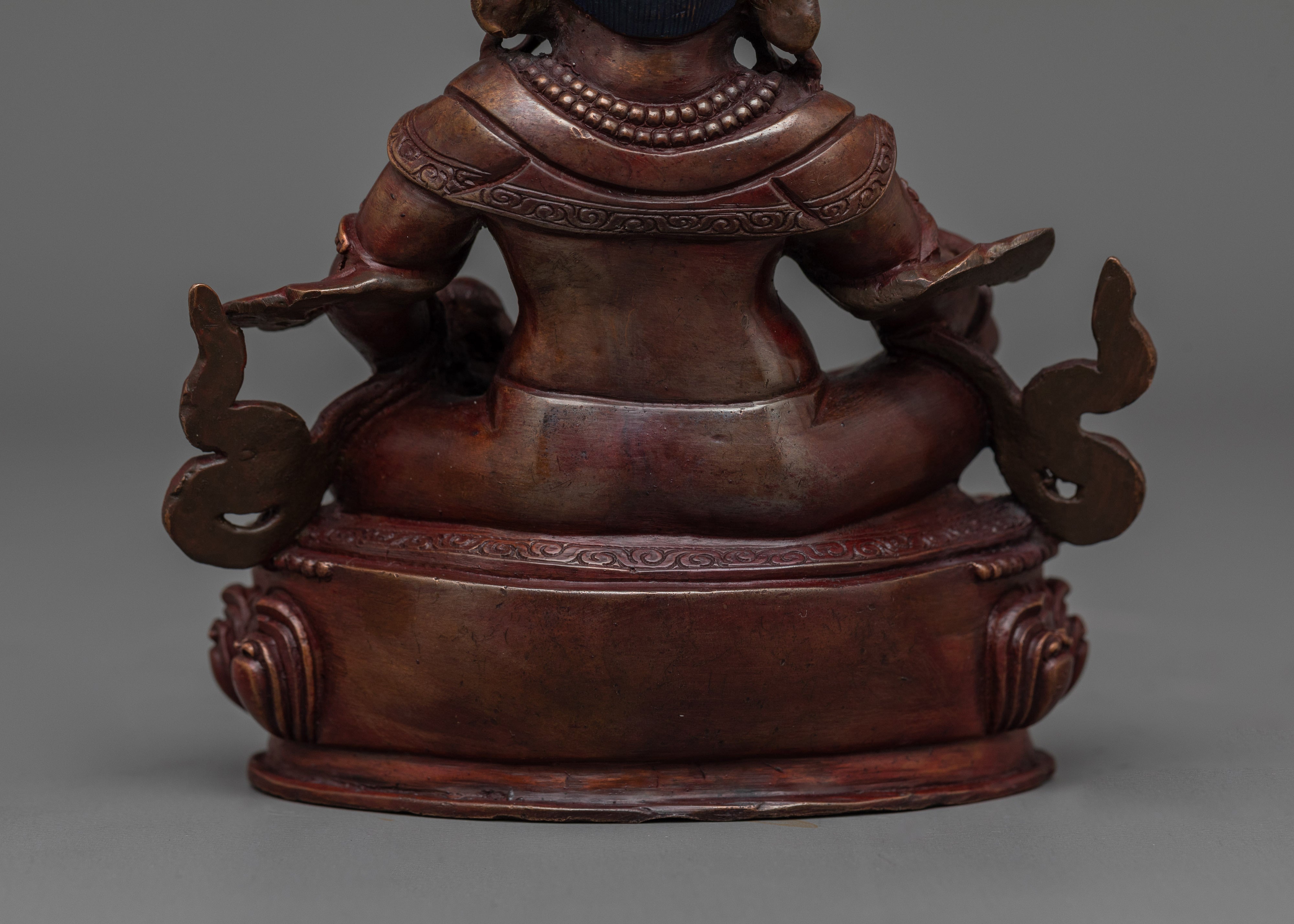 Dzambhala with Oxidized Copper Body Statue | The Embodiment of Prosperity