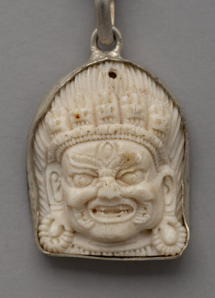 Hand-Carved Bhairav Locket with Five-Skull Crown | Buffalo Bone & White Metal