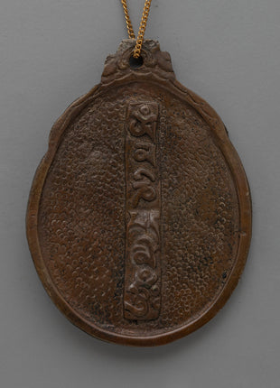 Handcrafted Buddhist Brass Locket with Sacred Symbols | Antique Spiritual Jewelry