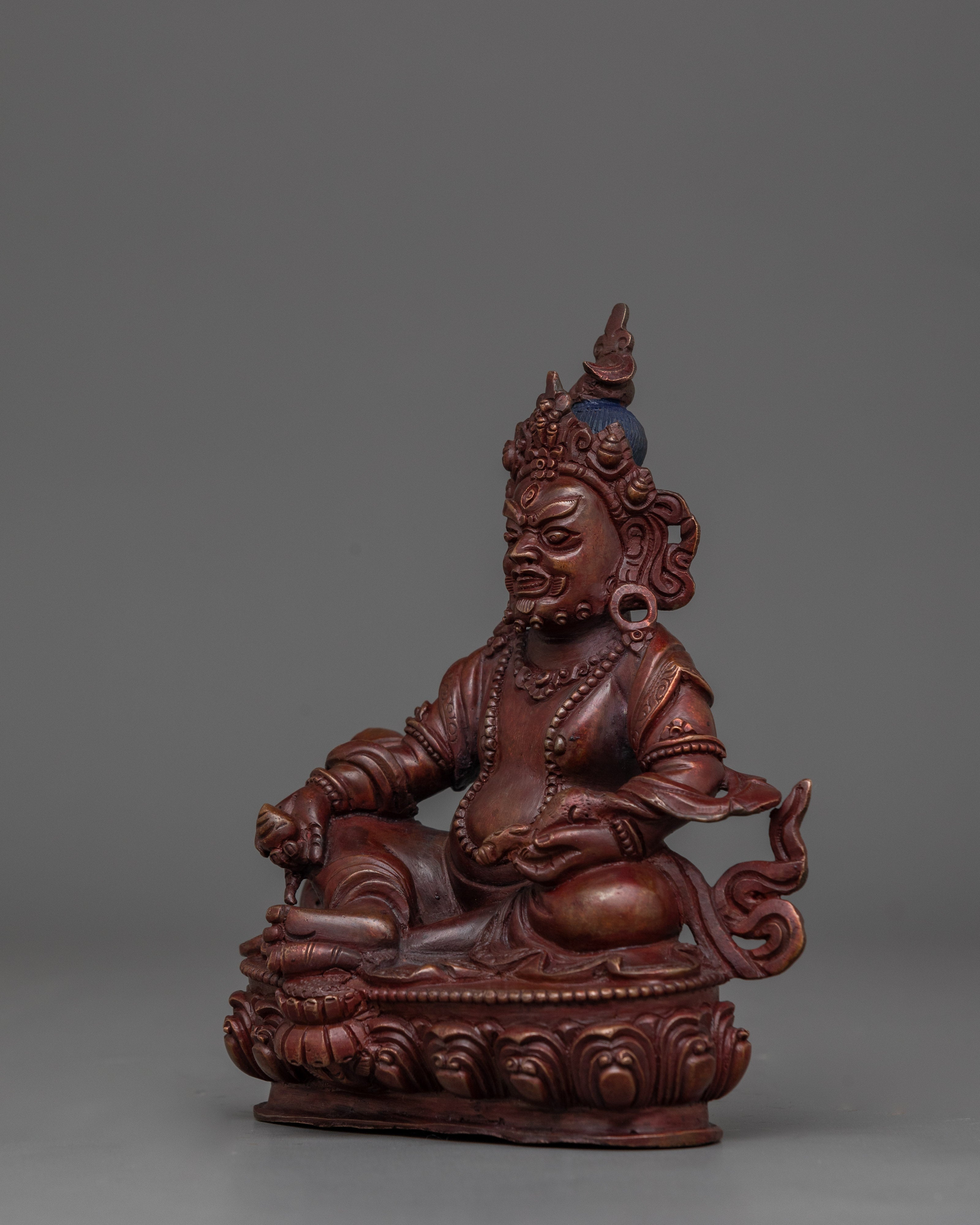 Dzambhala with Oxidized Copper Body Statue | The Embodiment of Prosperity