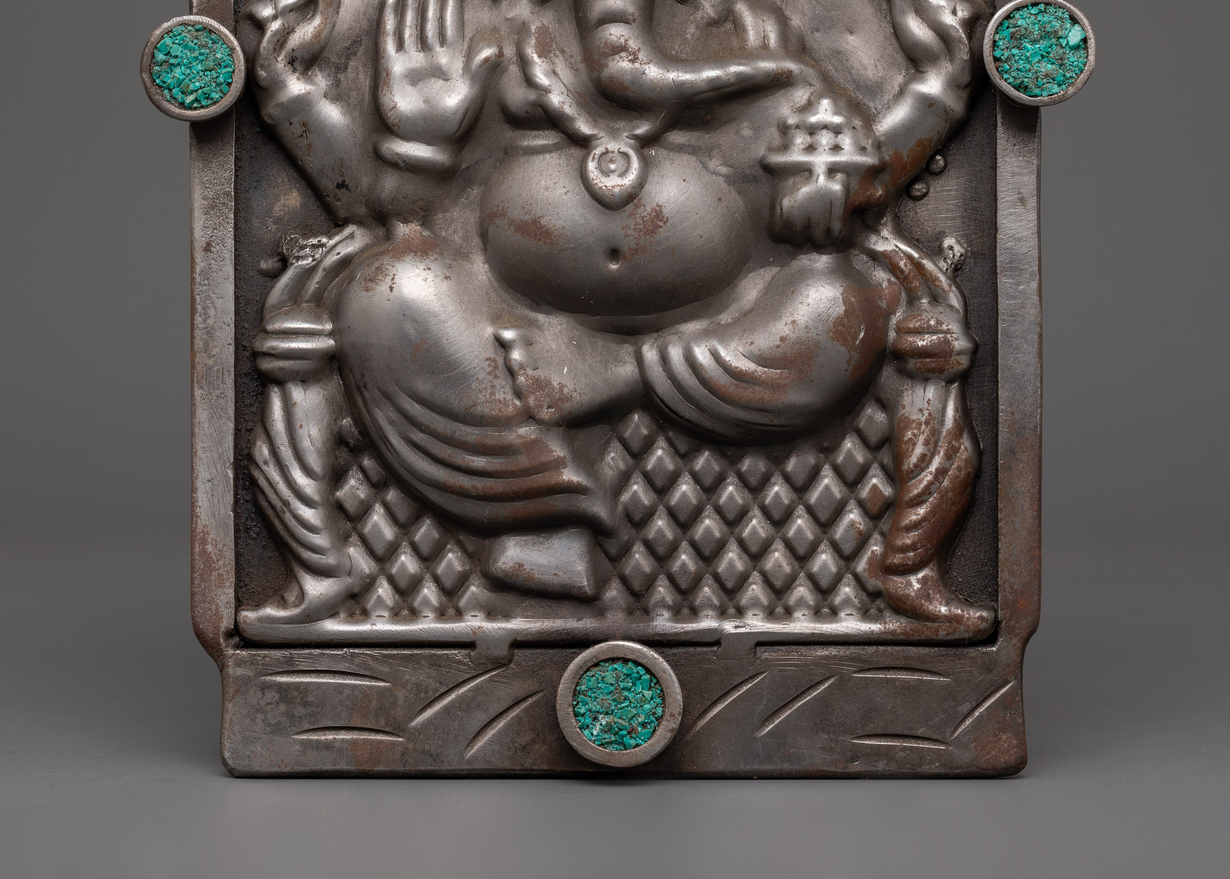 Hand-carved Ganesh Wall Hanging | Iron & Turquoise Stone Sculpture