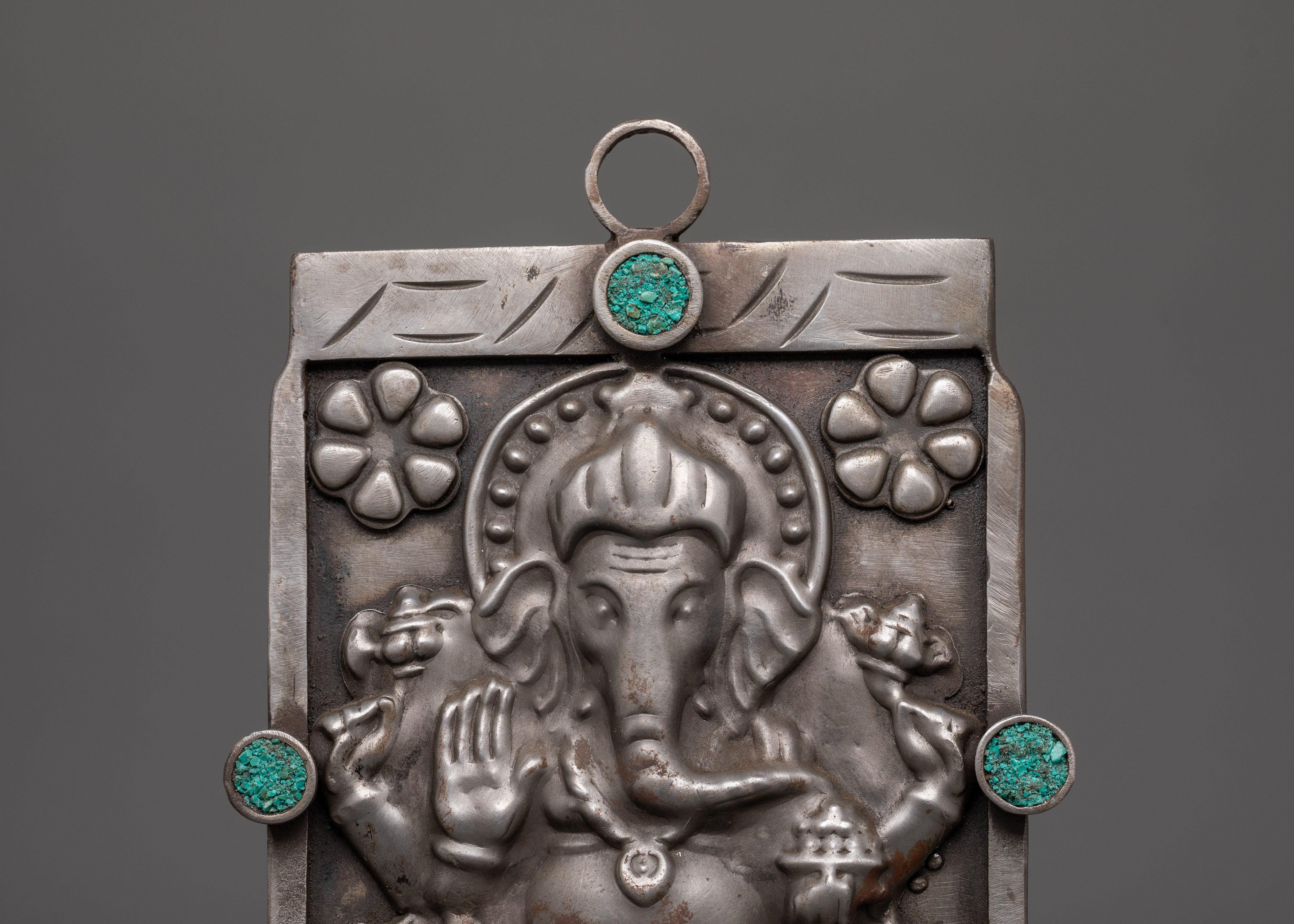 Hand-carved Ganesh Wall Hanging | Iron & Turquoise Stone Sculpture