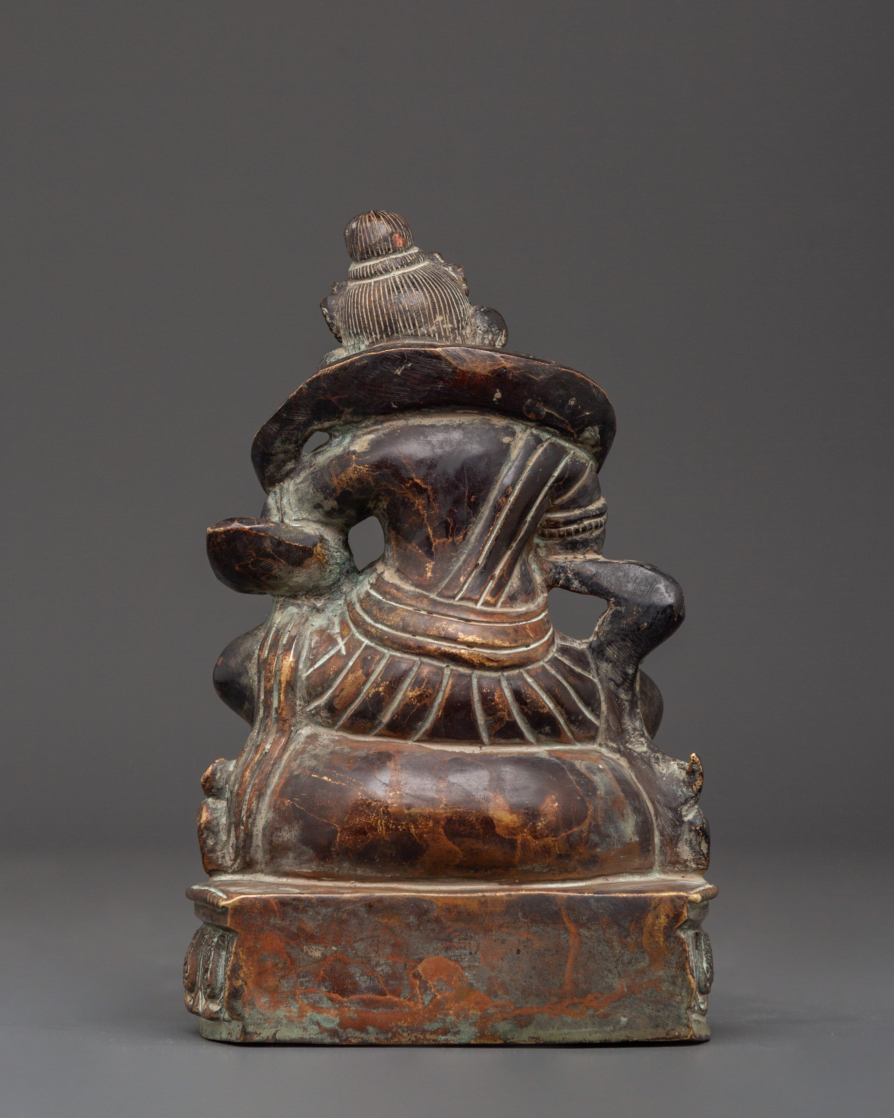 Tibetan Buddhist Dzambhala Oxidized Copper Statue | Sitting on Lotus