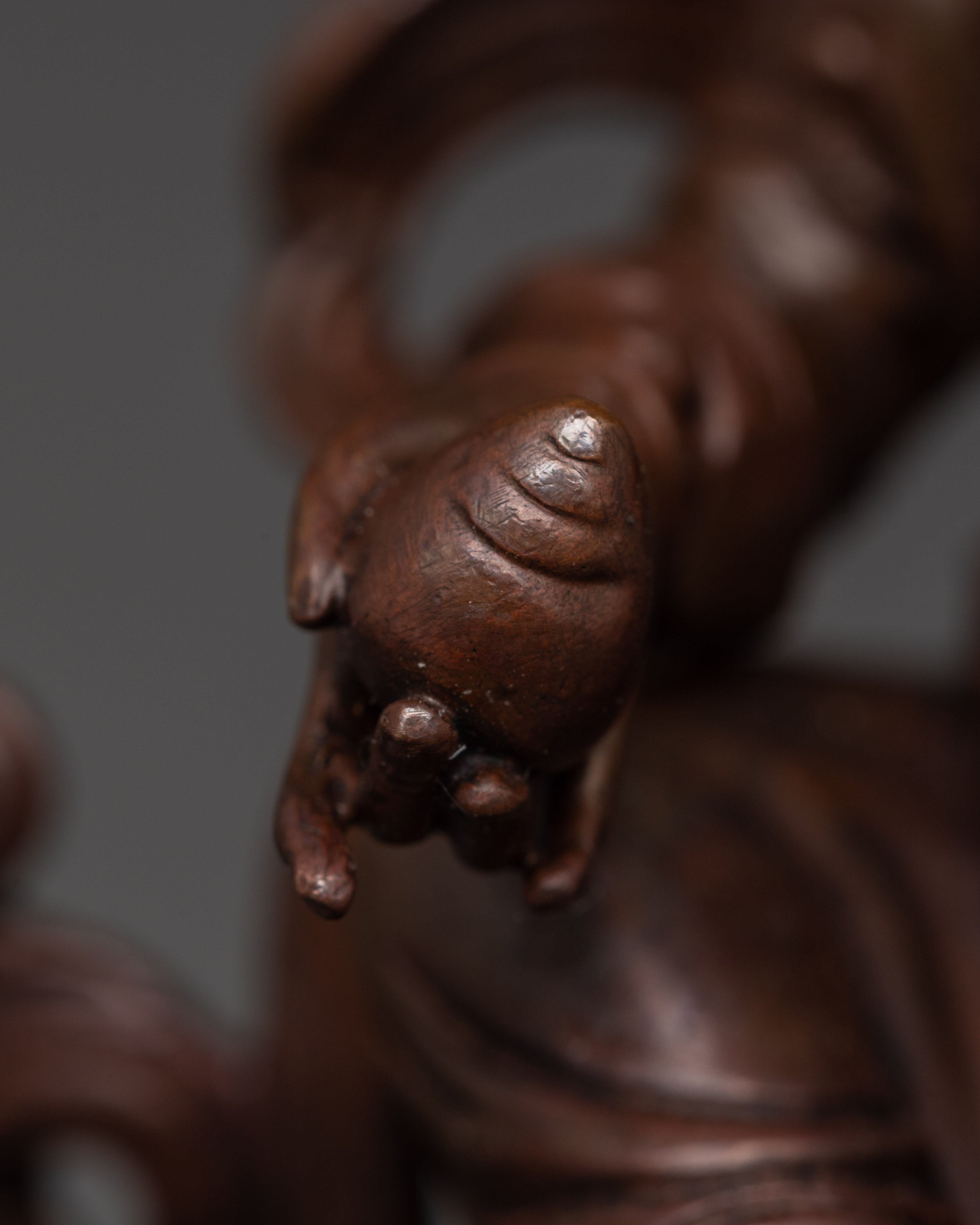 Oxidized Copper Dzambala Holding Conch | Tibetan Wealth Deity